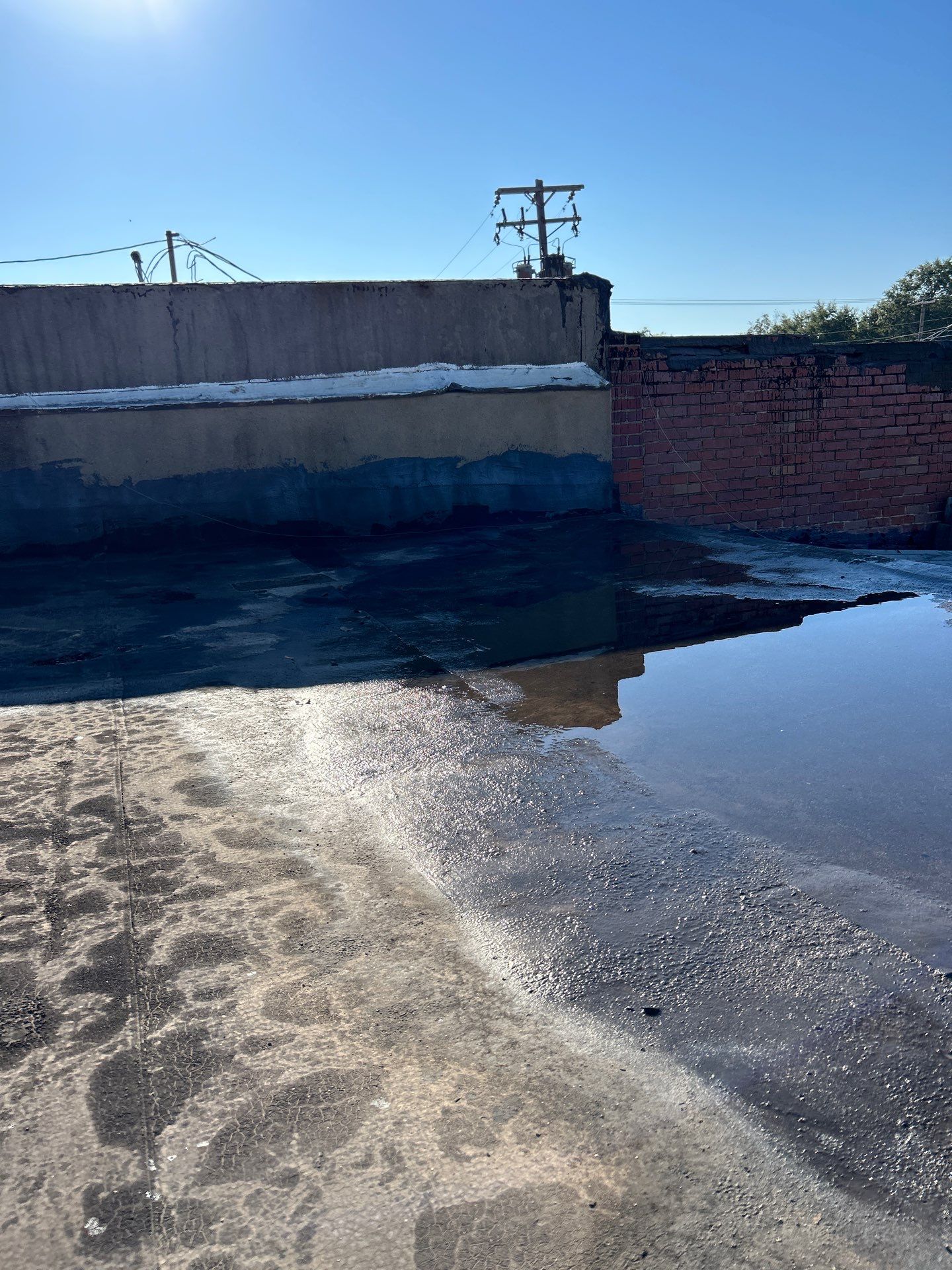 Downtown Gladewater Commercial Foam Roof Restoration – SPF + High-Tensile Acrylic by All Star Roofing LLC
