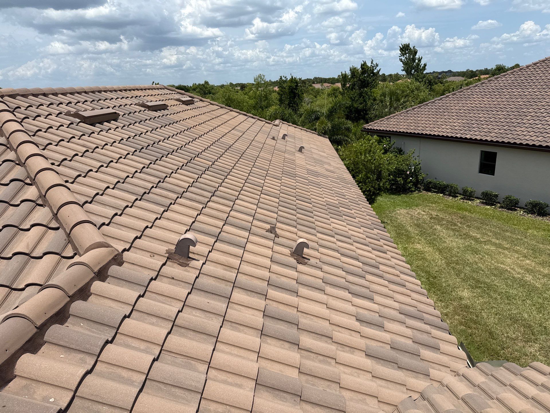 Concrete Tile Roof, Paver Driveway & Lanai Cleaning – Artisan Lakes Esplanade, Palmetto, FL by Sunshine AquaWash