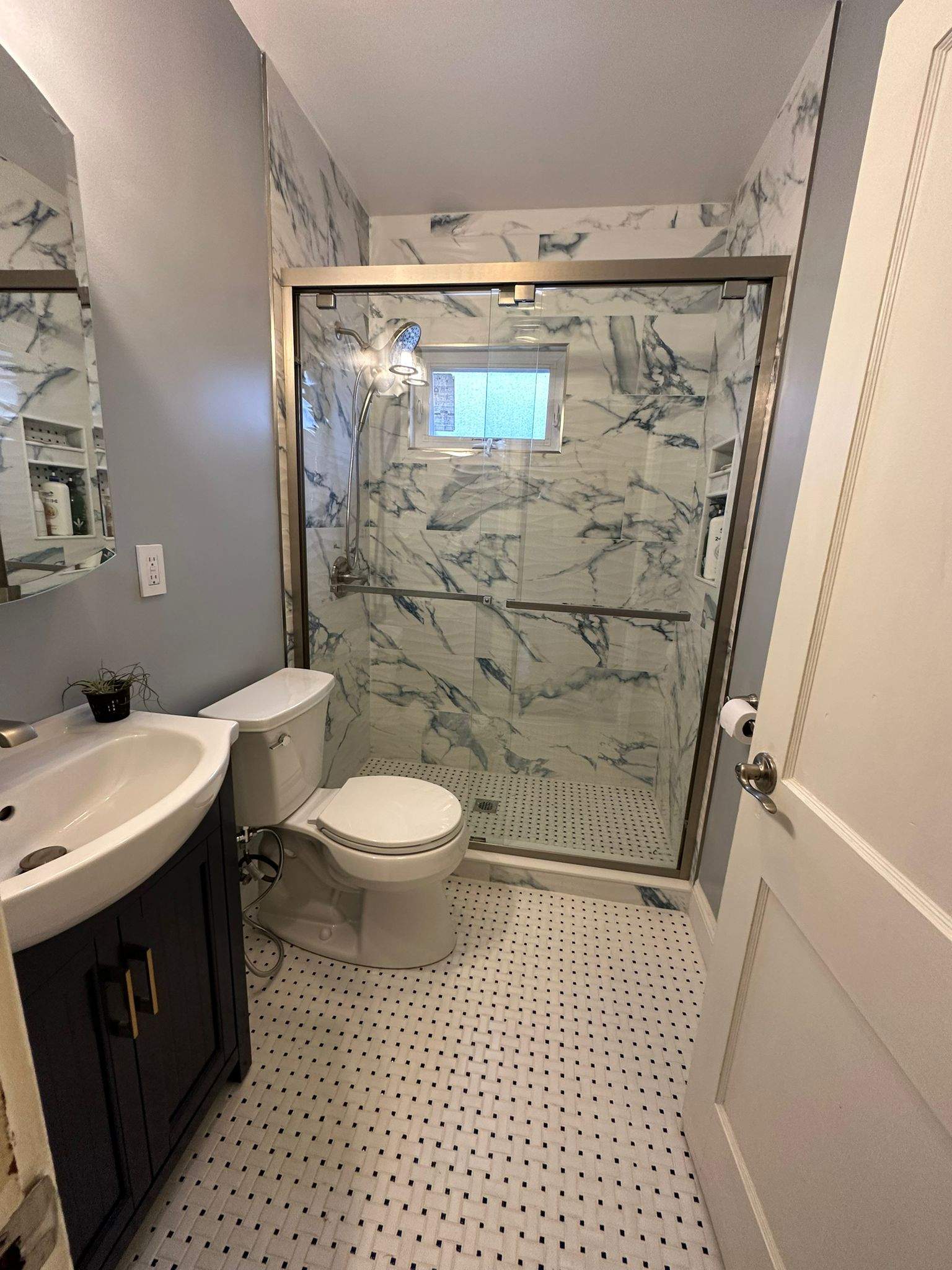 Bathroom Remodel using Tile by Home Concepts Construction