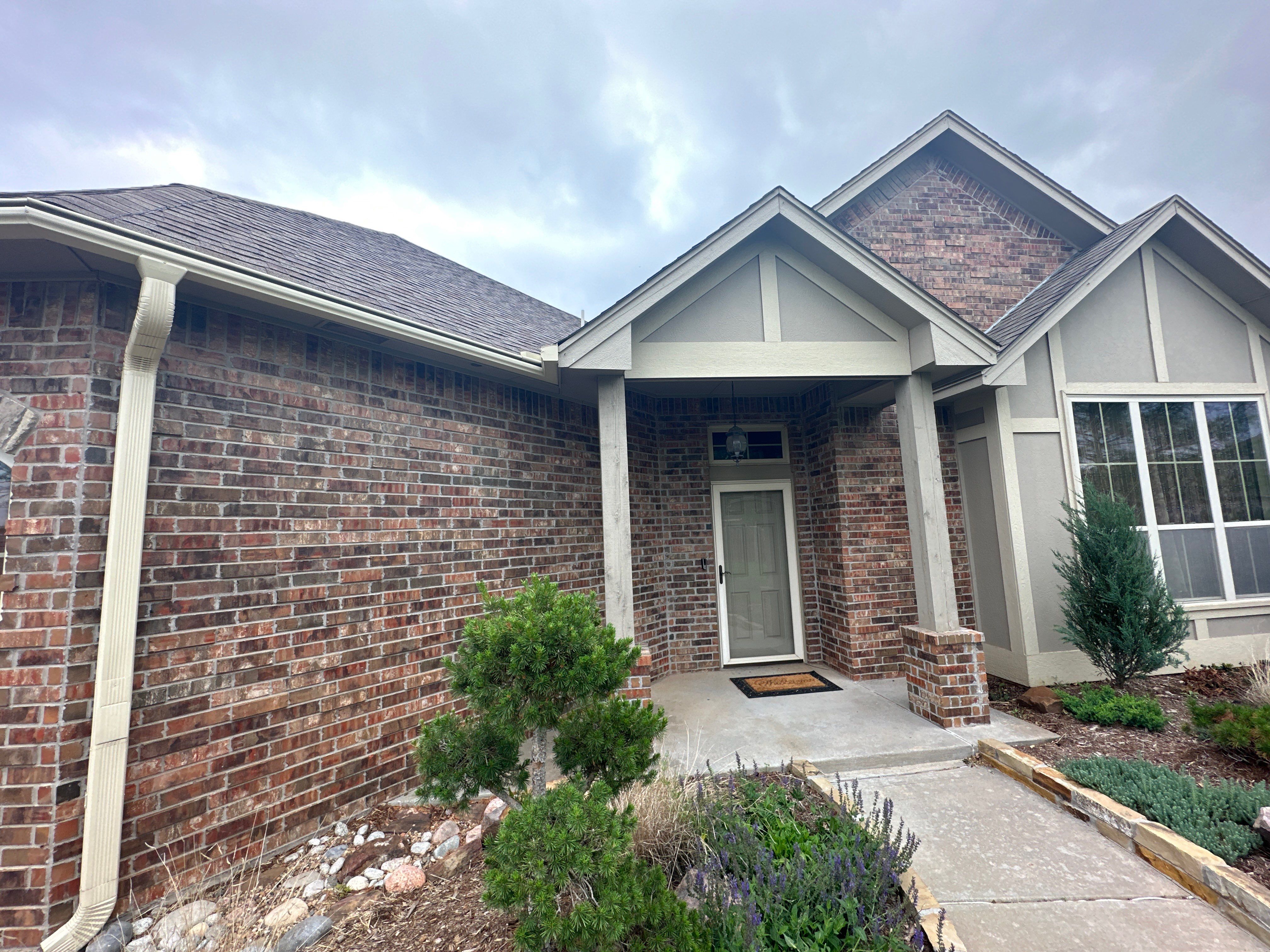Reroof using Owens Corning Duration Storm IR in Driftwood by Castillo Roofing