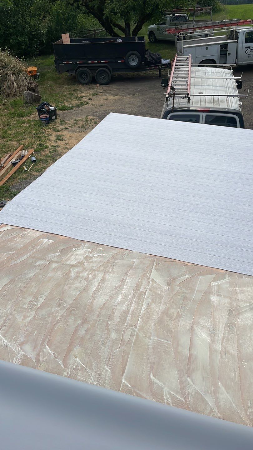 Residential Deck Replacement using Dec-Tec Membrane Color: Grafton by Orezona Building & Roofing Company, Inc.