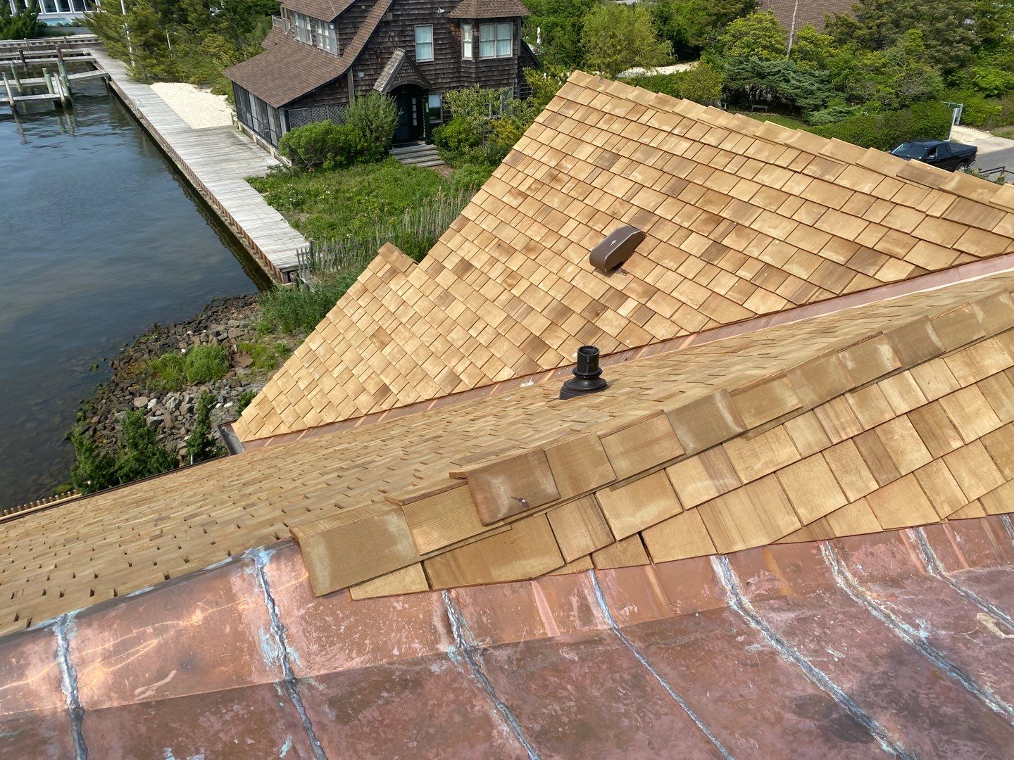 Residential Roofing Installation using Cedar Shakes by CMNG LLC