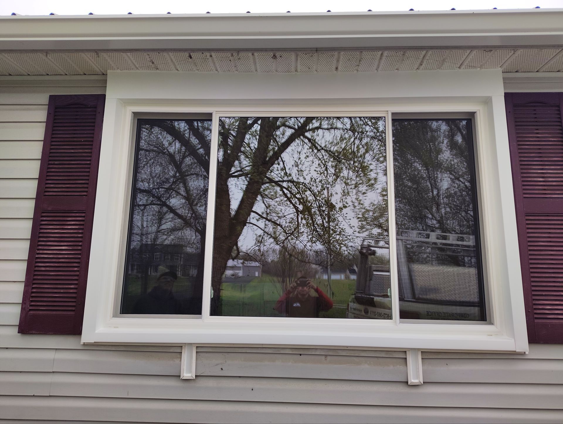 Entry Door with sidelite and storm door and bow by Aspen Home Improvements