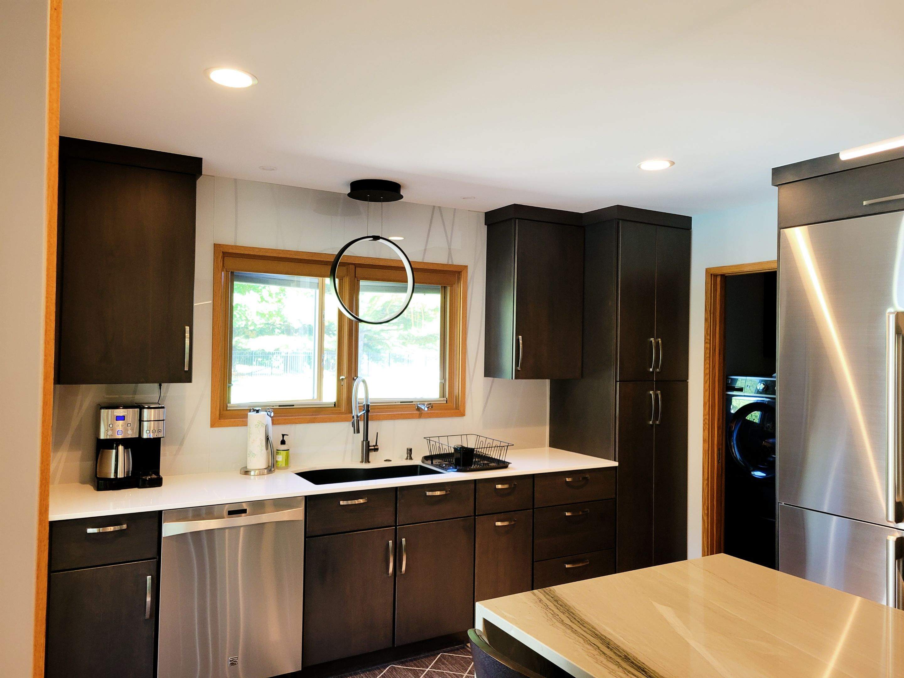 Kitchen Remodel using IMAGIO Misty Curves Solid Glass Backsplash by IMAGIO