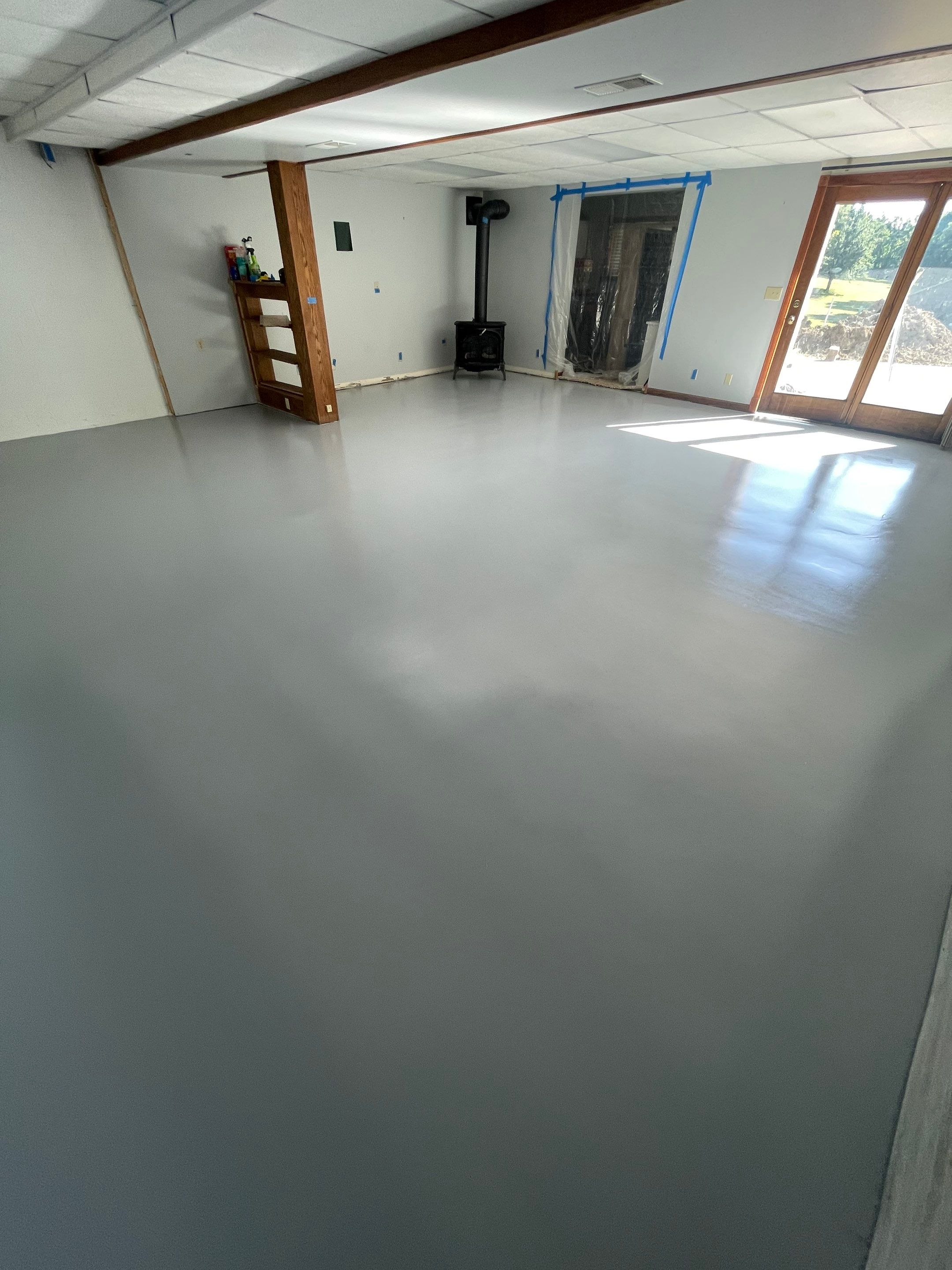 Solid Color Concrete Floor Coating for Renner Basement by Select Painting, Coatings & Garage Cabinets