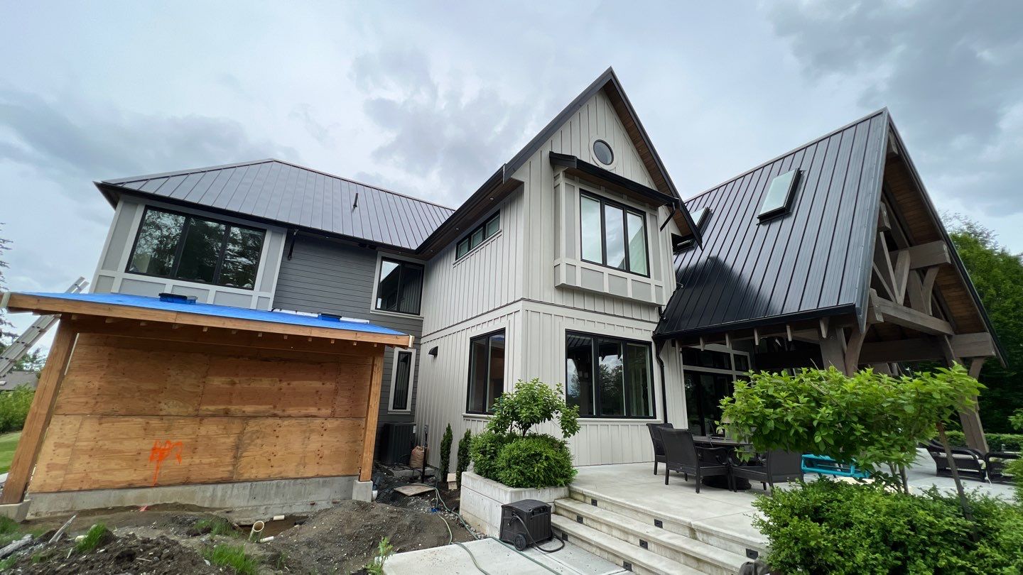 Commercial Roofing Installation using 12" Prolok metal  by Top Notch Roofing Inc