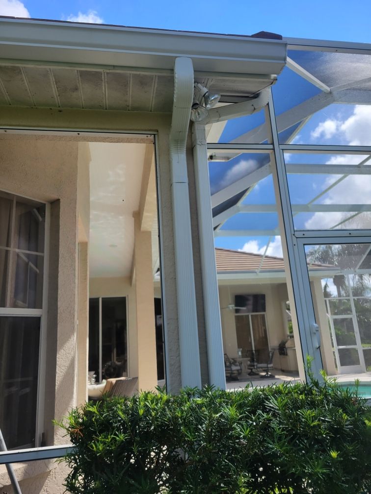 6-inch Seamless Gutter Installation with Splash Guard in University Park, FL by Gutter Professors