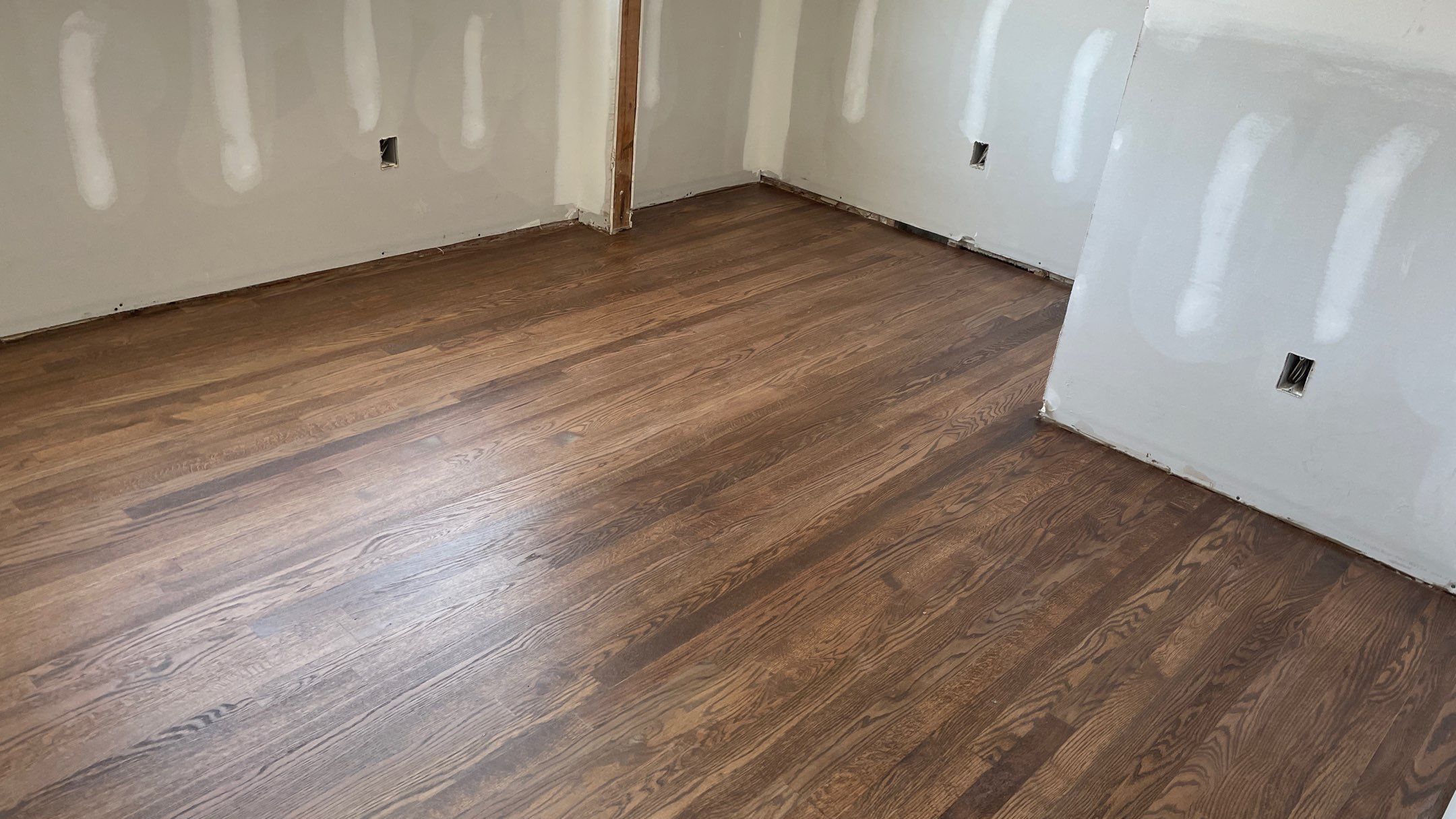 Remodeled Home with new tile floors, Showers and Refinished Oak Floors with stain and Waterbased Finish by Footprints Floors of Coastal Carolina