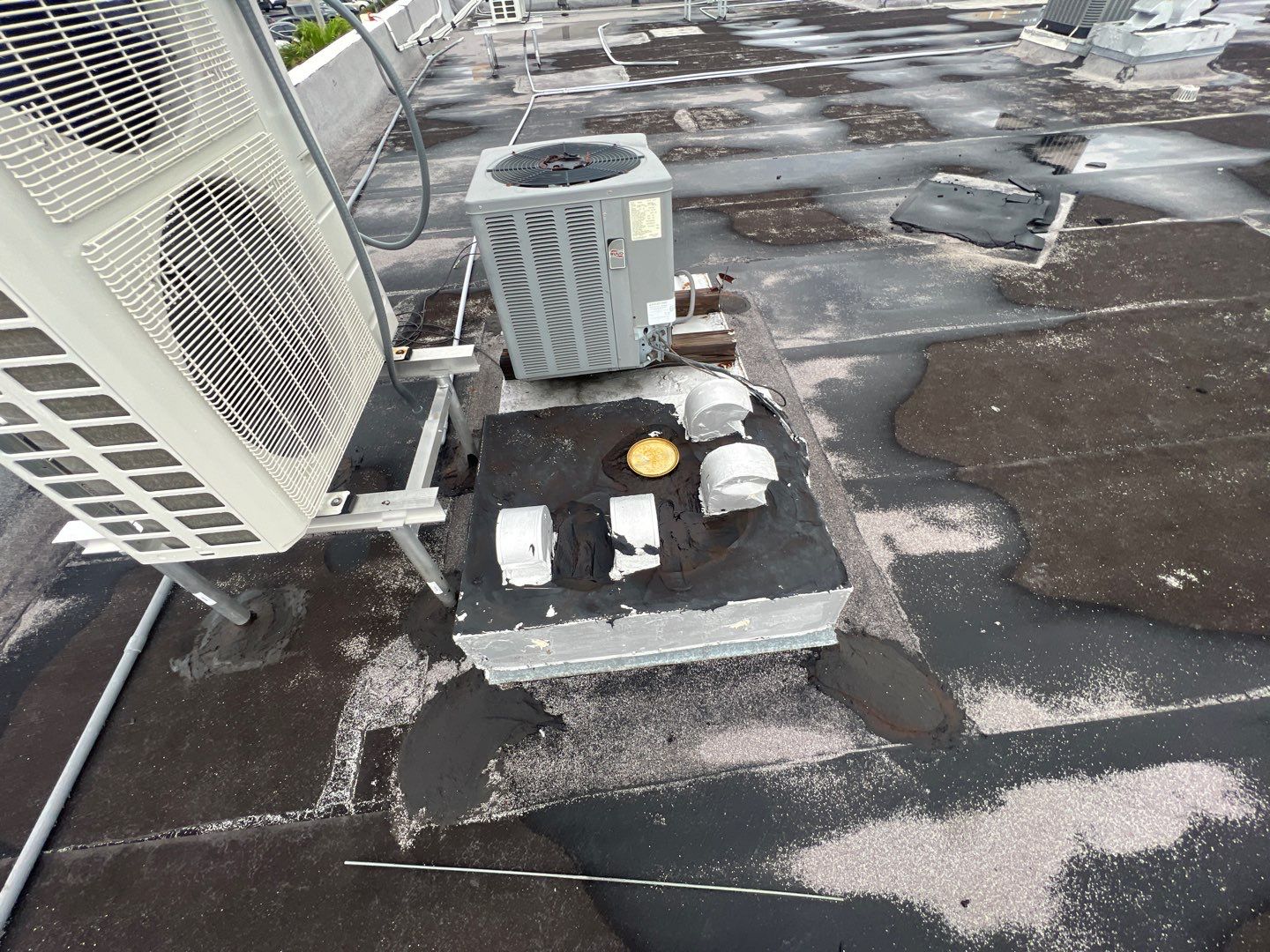 Commercial Roofing Repair using Roof Sealant by Four Peaks Roofing