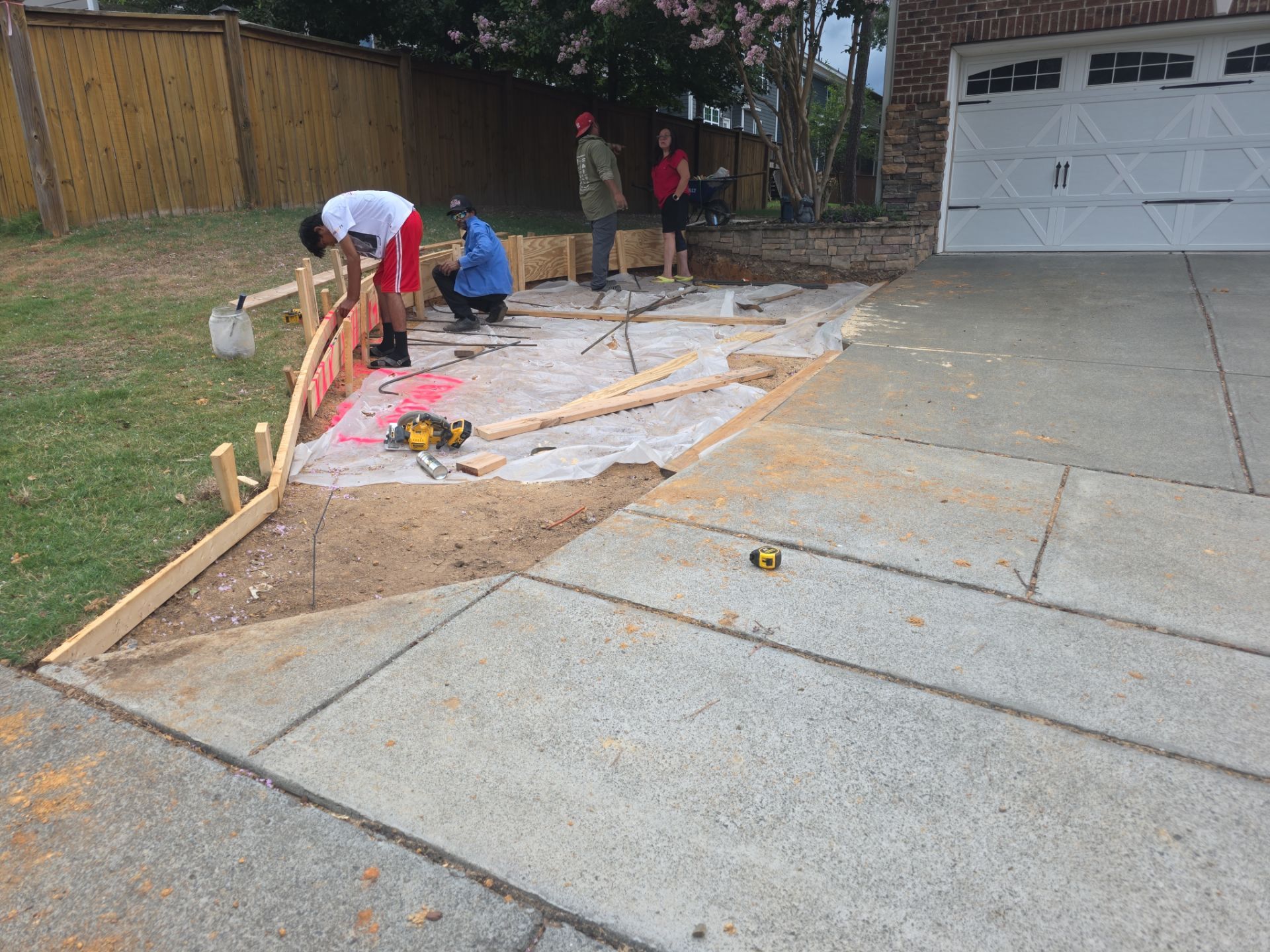 Concrete Driveway Expansion & Retaining Wall | Apex, NC by Elite Remodeling and Design LLC