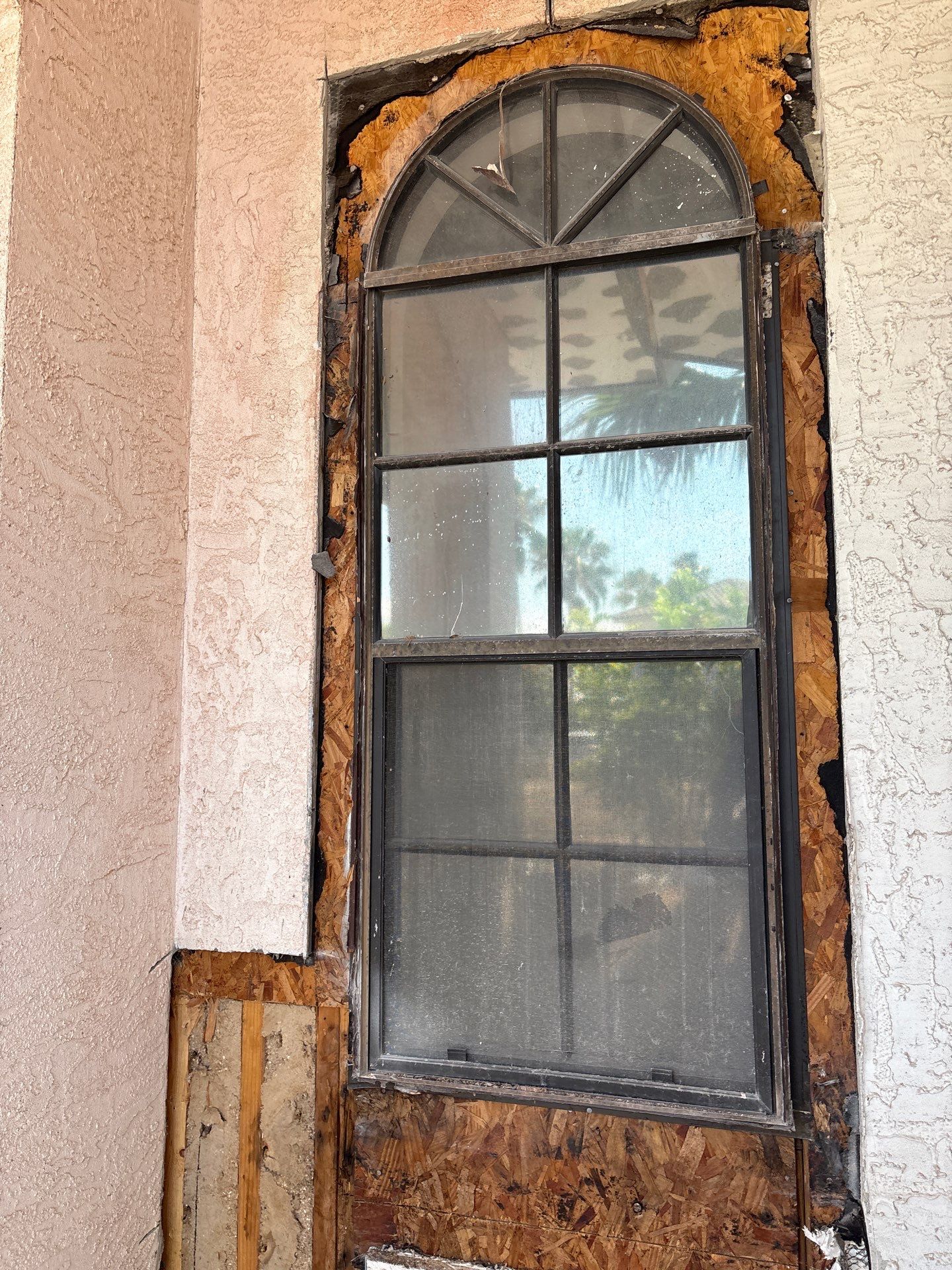 Installing Windows on a Submarine  by Bayfront Roofing and Construction
