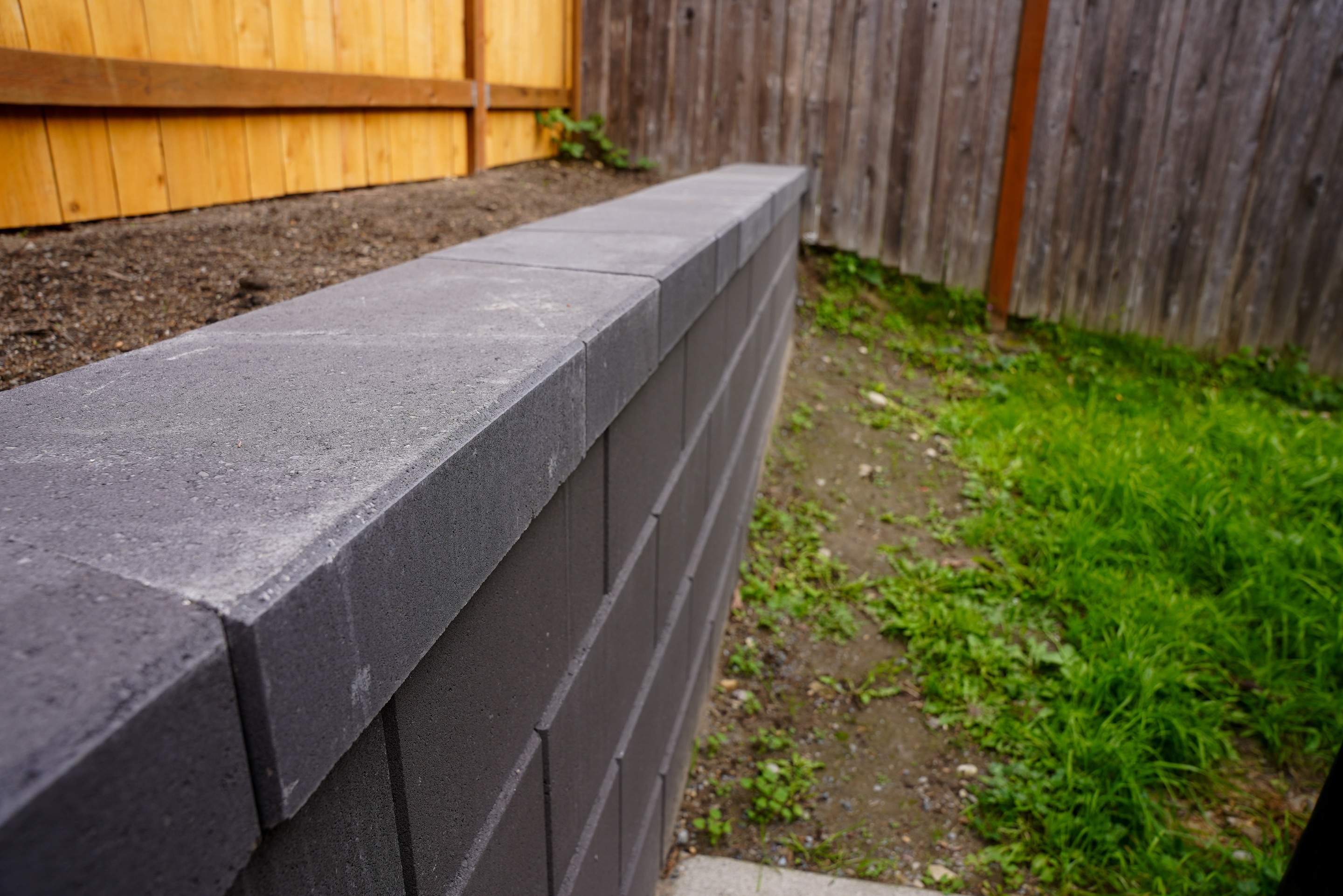 Jireh Outdoor Projects | Retaining Wall & Fence Build by Jireh Asphalt & Concrete Inc 