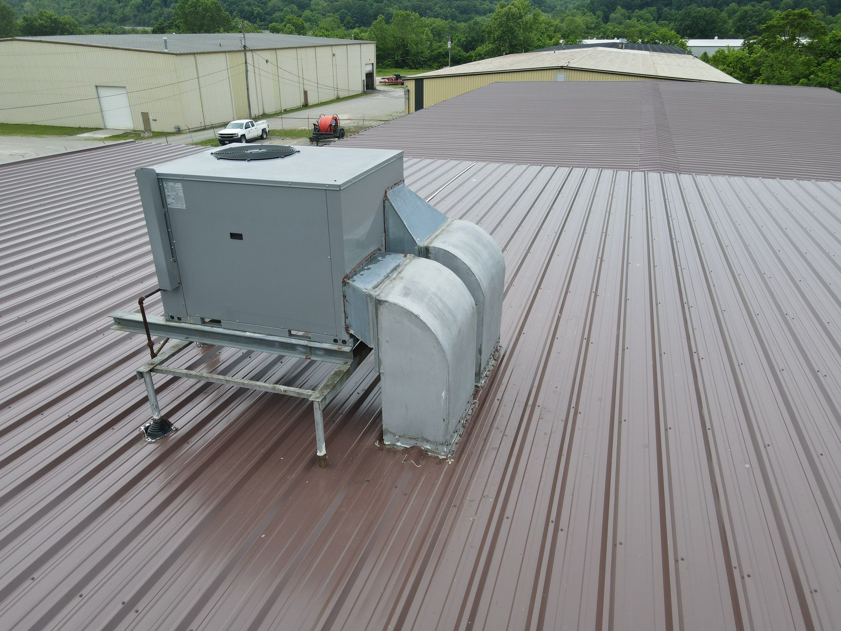 Commercial Roofing Installation using Metal by Rainstoppers Roofing