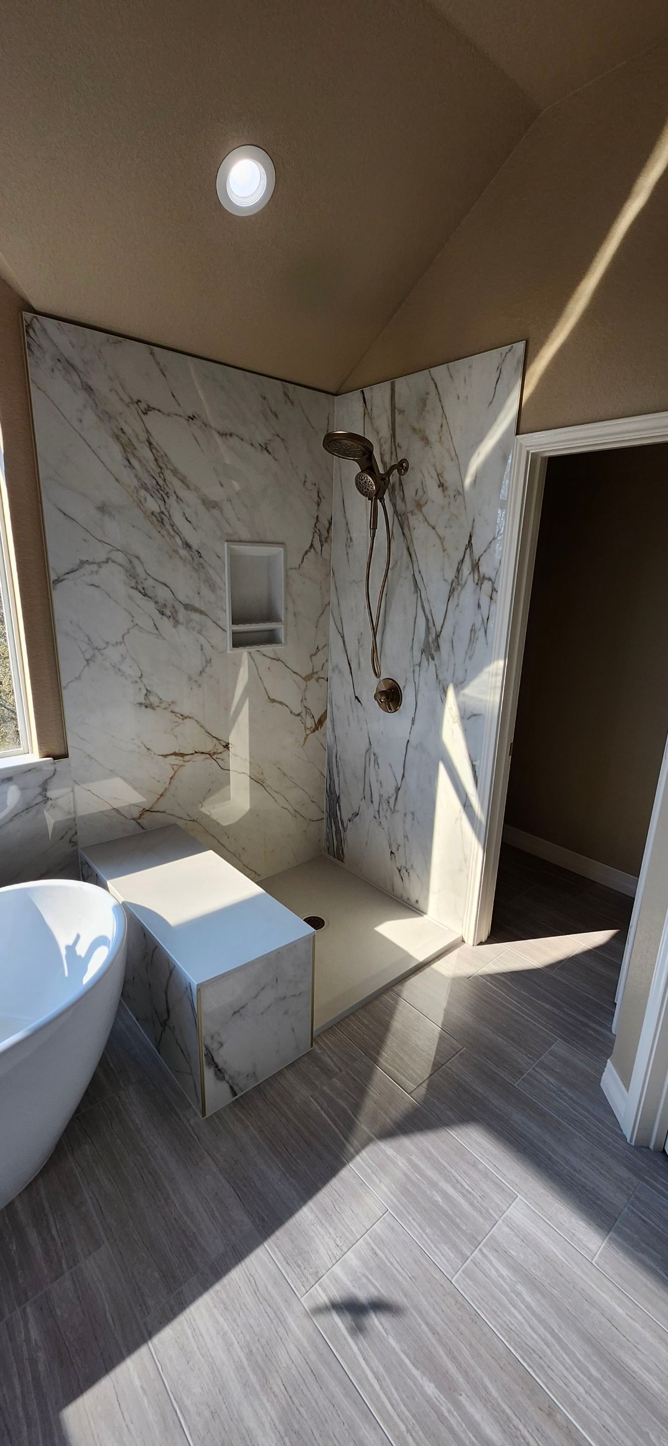 Stone Oak Bathroom Remodel with Freestanding Tub & Walk-In Shower by Legacy Bath and Kitchen