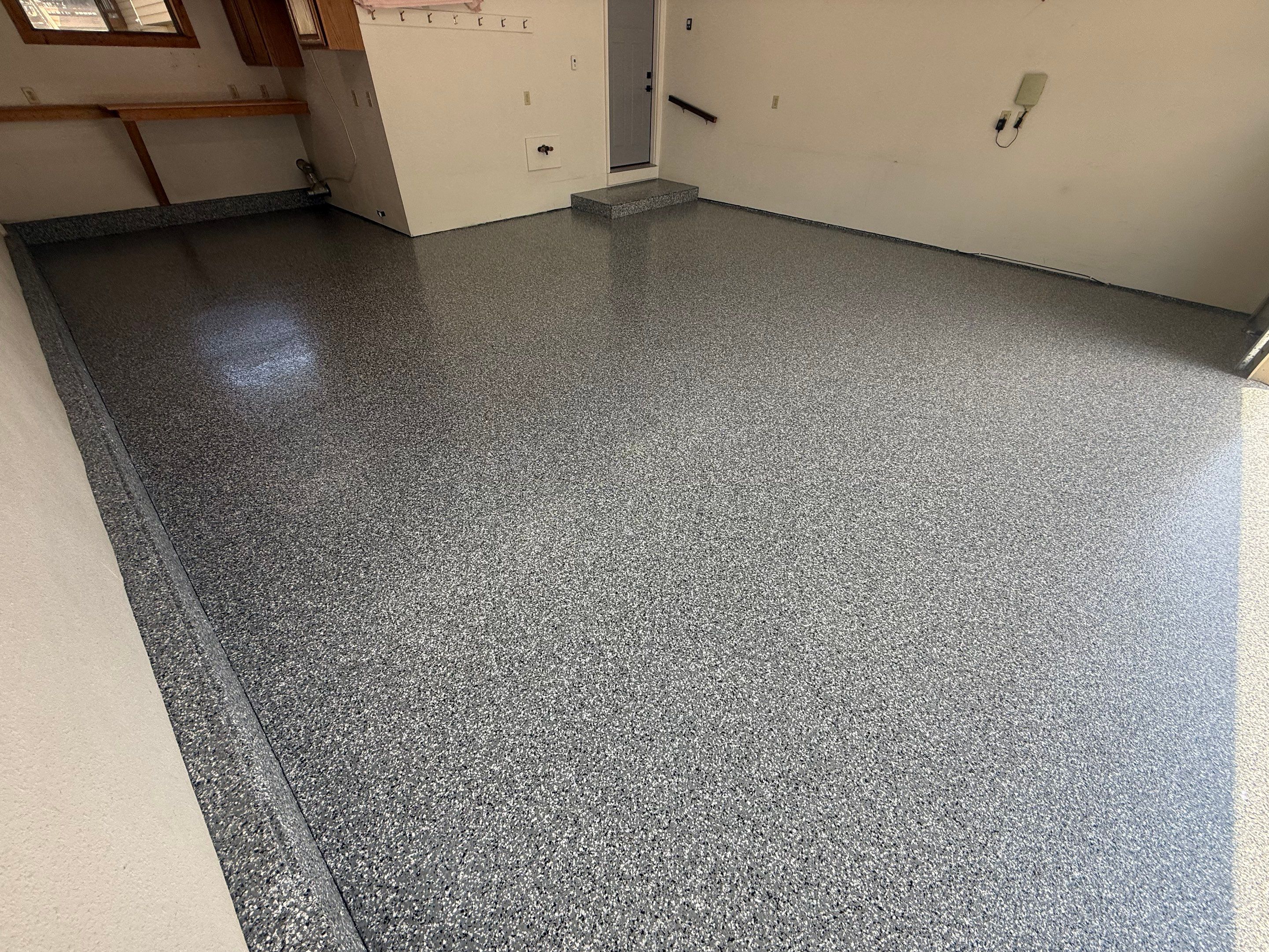 Smoke Flake Garage Floor Coating in Dell Rapids by Select Painting, Coatings & Garage Cabinets
