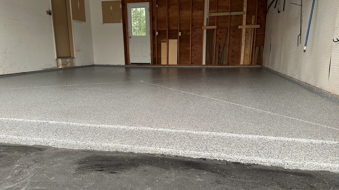 Silverado garage floor and patio coating  by NG Masonry & Construction LLC