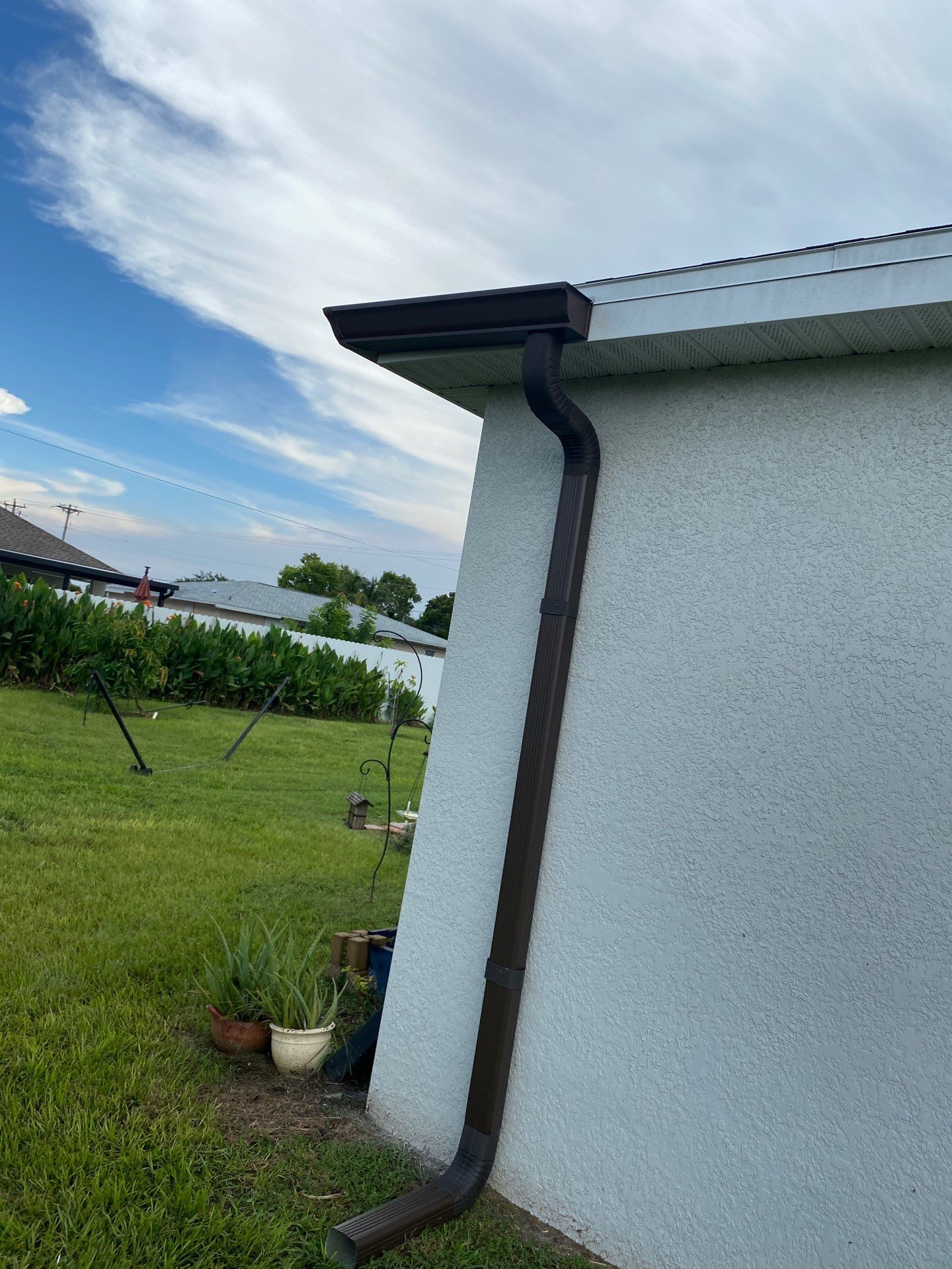Brown Seamless Gutters using Royal Brown in Cape Coral FL by Gutter Professors