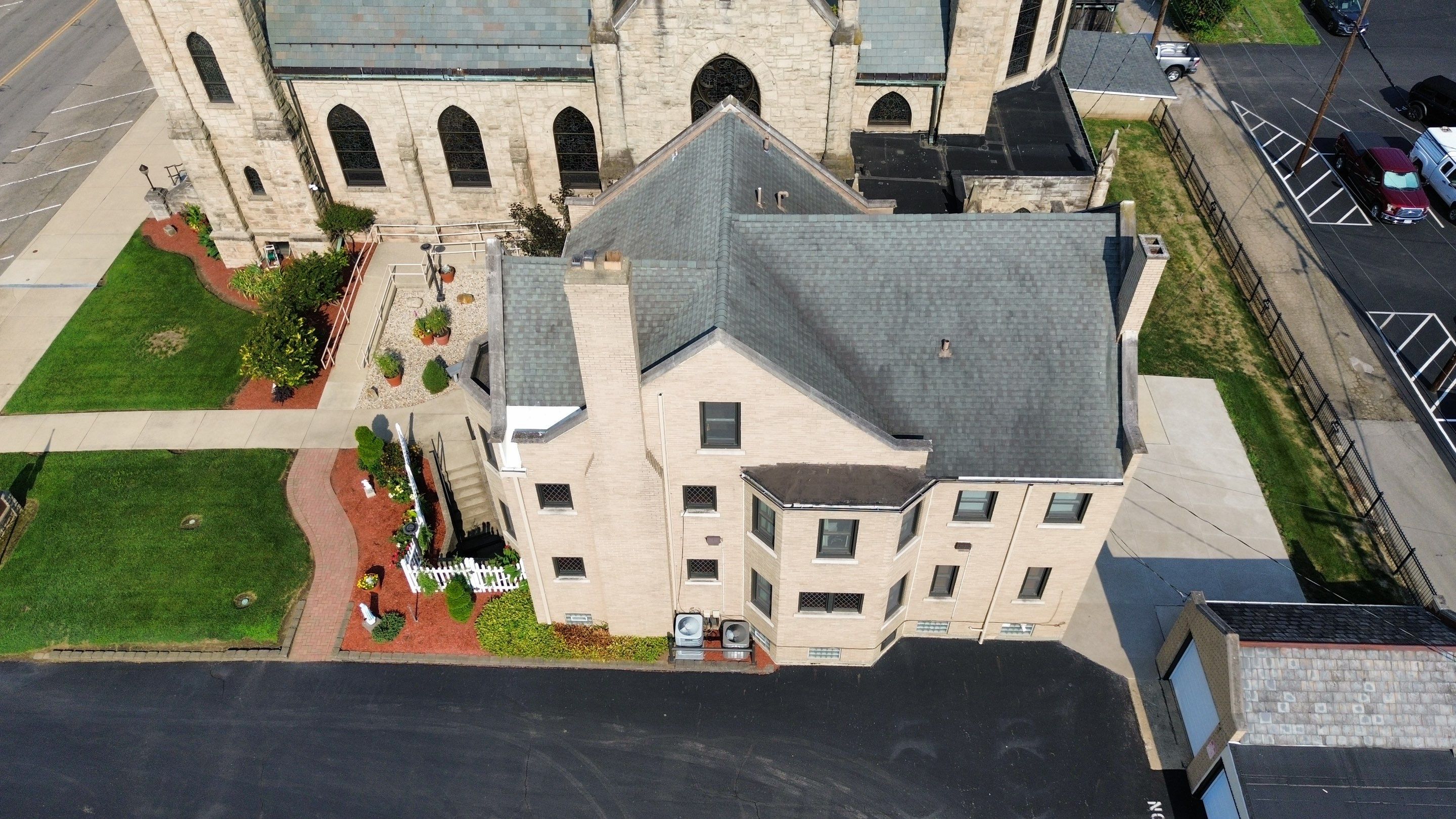 Commercial Roofing Installation using Standing Seam Metal - Frost Black by RoofX 