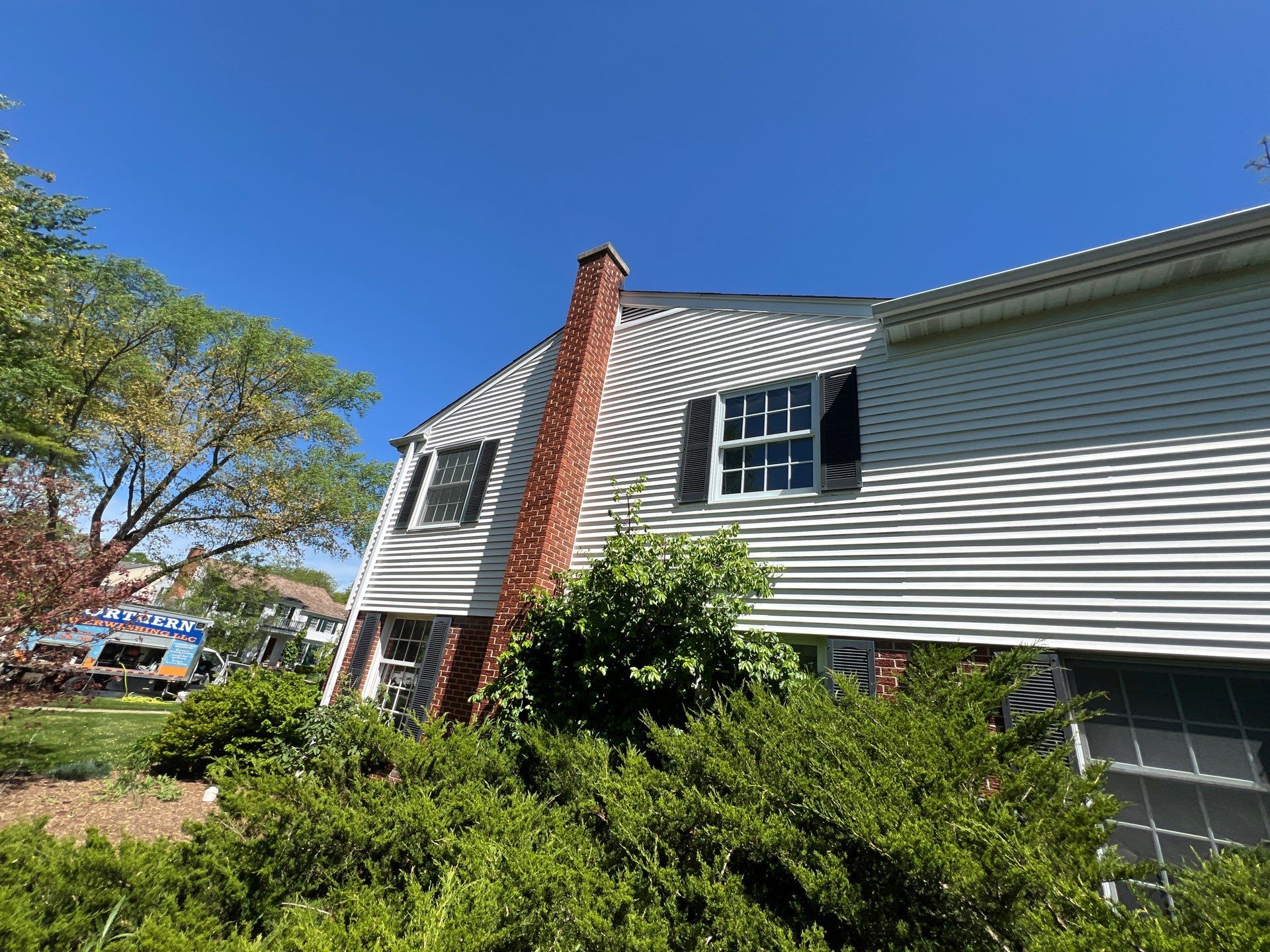 Housewashing  using Algaecide, soft wash soap by Northern Power Washing LLC.