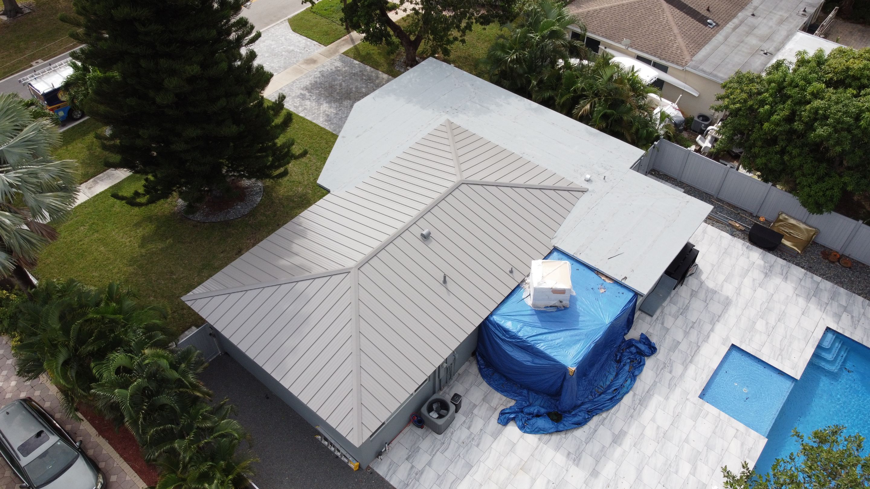 Residential Roofing Installation using 1" Nail strip metal roof by BLUES BROTHERS CONSTRUCTION CORP