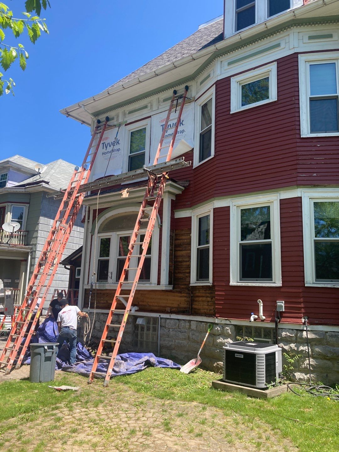 Exterior Renovations- Siding, Stamped Concrete, Porch, and Railings by Ivy Lea Construction