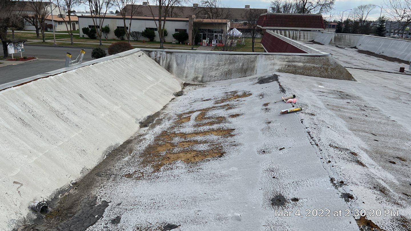 Commercial Roofing Installation using General Coatings acrylic coatings and spray foam by Straight Edge Roofing Inc
