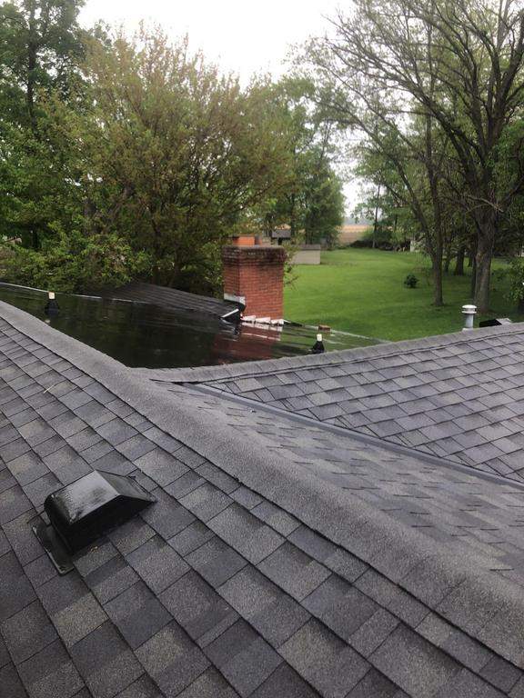 Residential Roofing Installation using 60 mil rubber roof  by Nitro Roofing and Construction