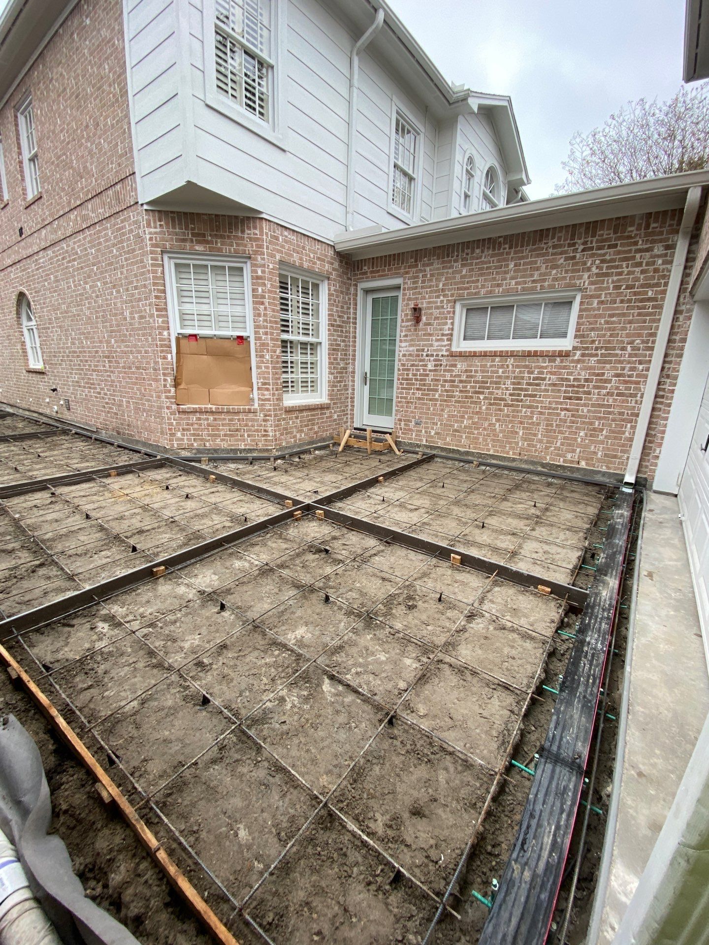 Driveway Concrete Replacement & French Drainage System by Texas Urban Elements