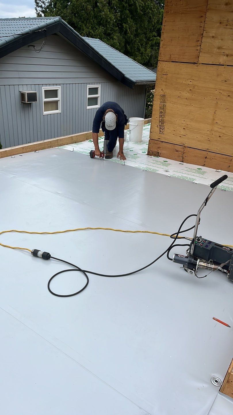 Residential Roofing Installation using Durolast roofing membrane by Top Notch Roofing Inc