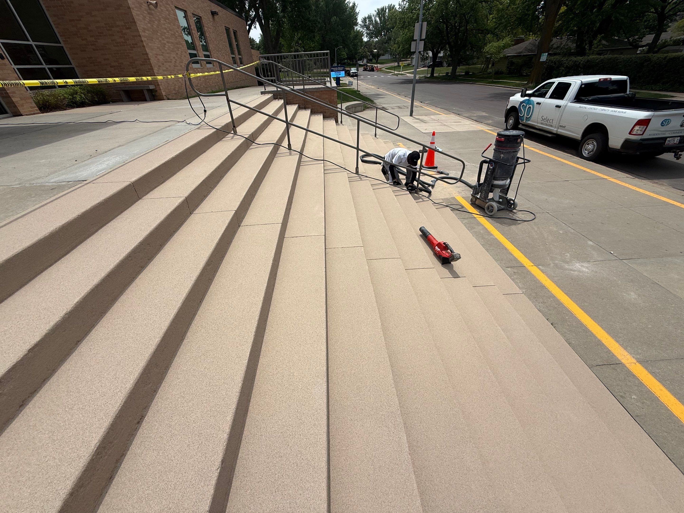 Concrete Stair Repair and Protective Coating in Sioux Falls by Select Painting, Coatings & Garage Cabinets