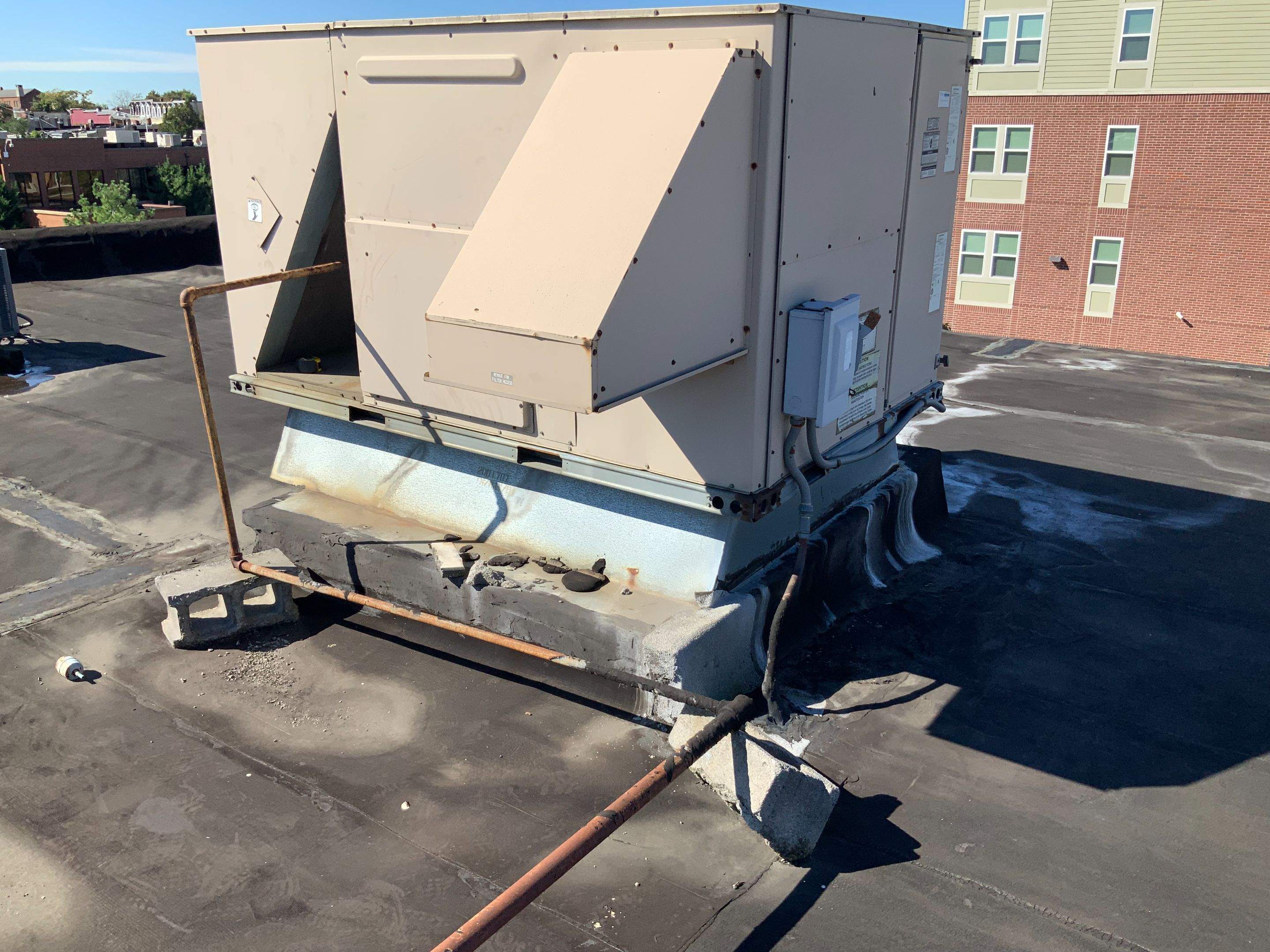 Commercial Roofing Repair using new Flashing by Alpha Design Services
