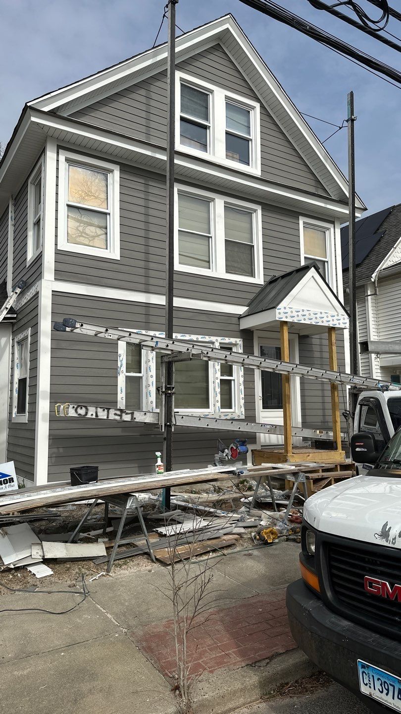 Siding Installation using Hardie Plank Aged Pewter by A Plus Exterior