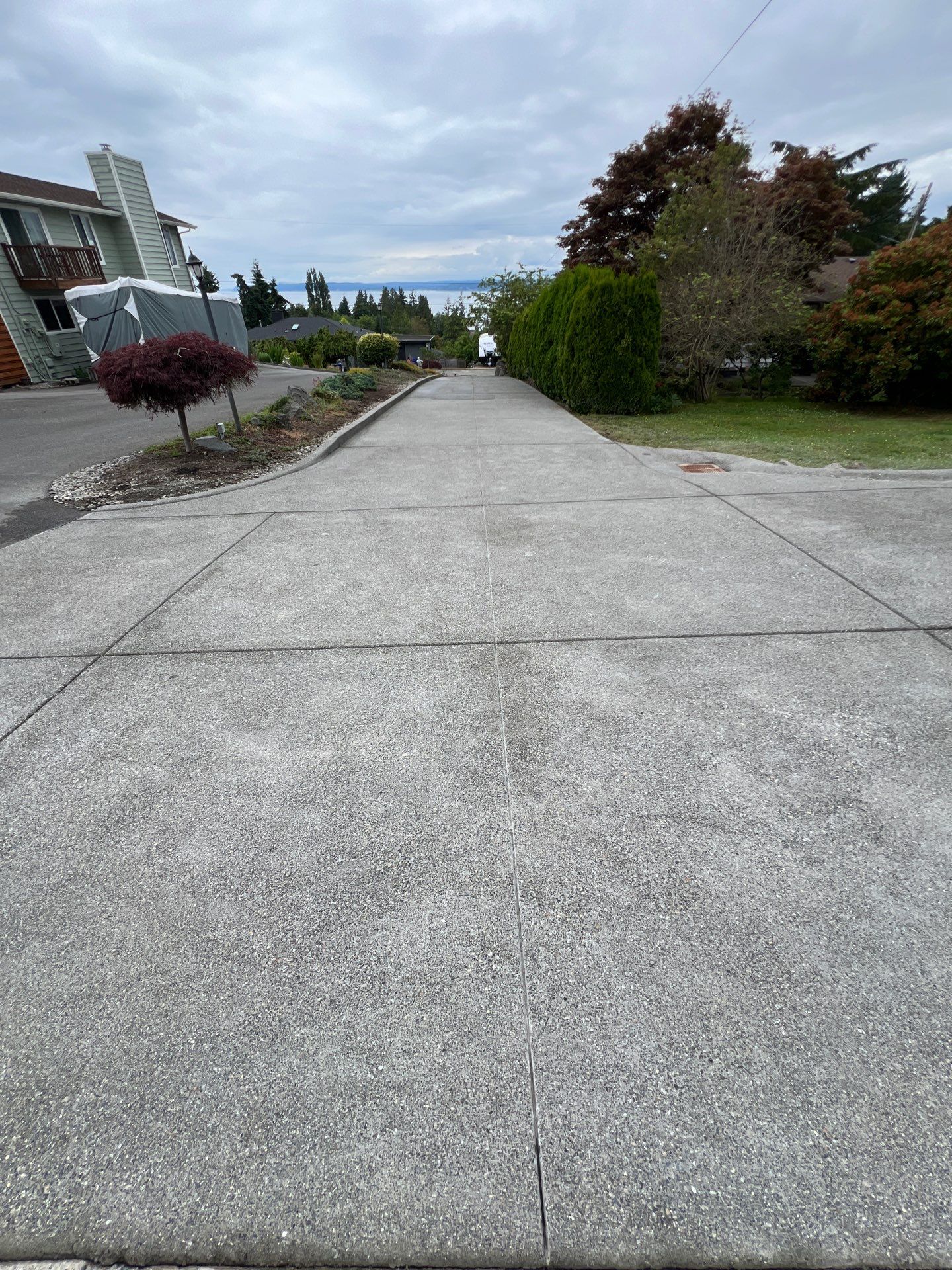 Concrete Driveway Makeover w/ Asphalt Patch | Everett  by Jireh Asphalt & Concrete Inc 