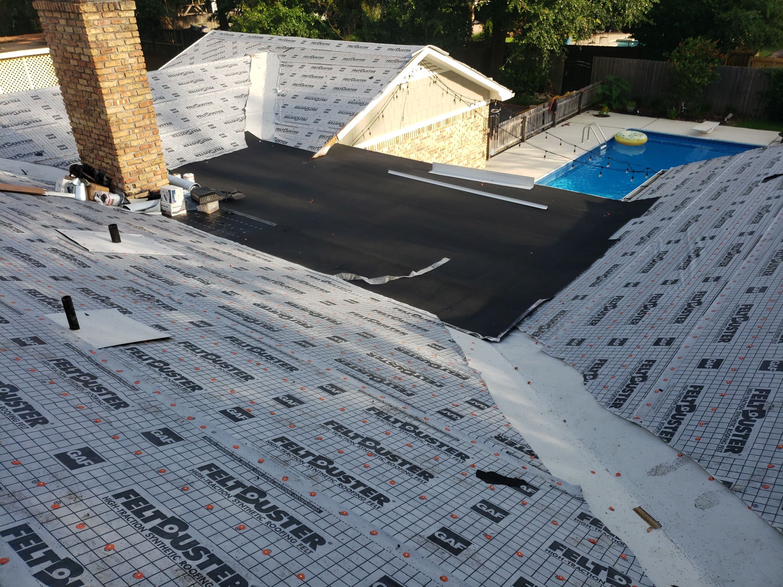 Residential Roofing Installation using Roof Replacement by American Roofing & Construction LLC