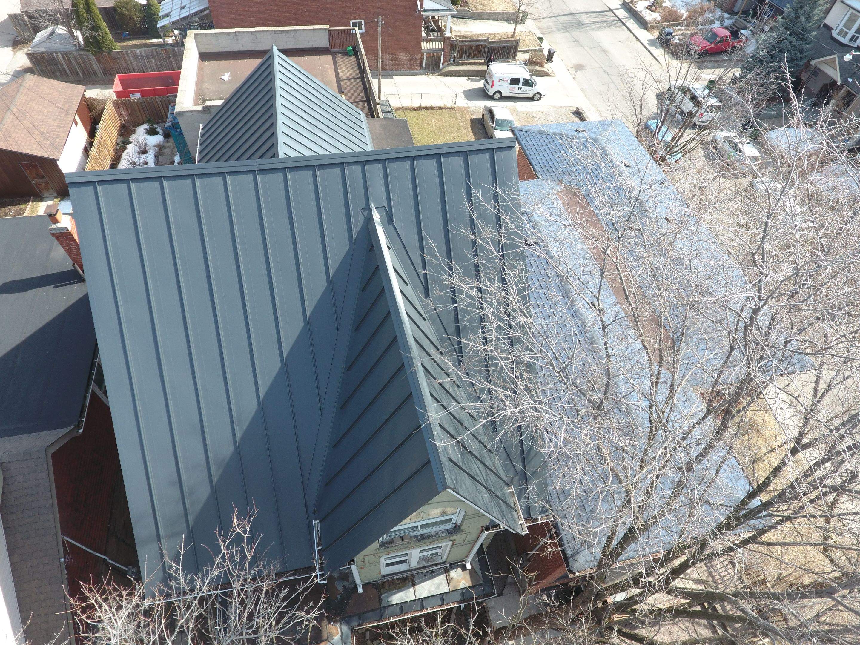 Standing Seam Metal Roofing using 16" Standing Seam Panels by Jay Carter Roofing & Sheet Metal