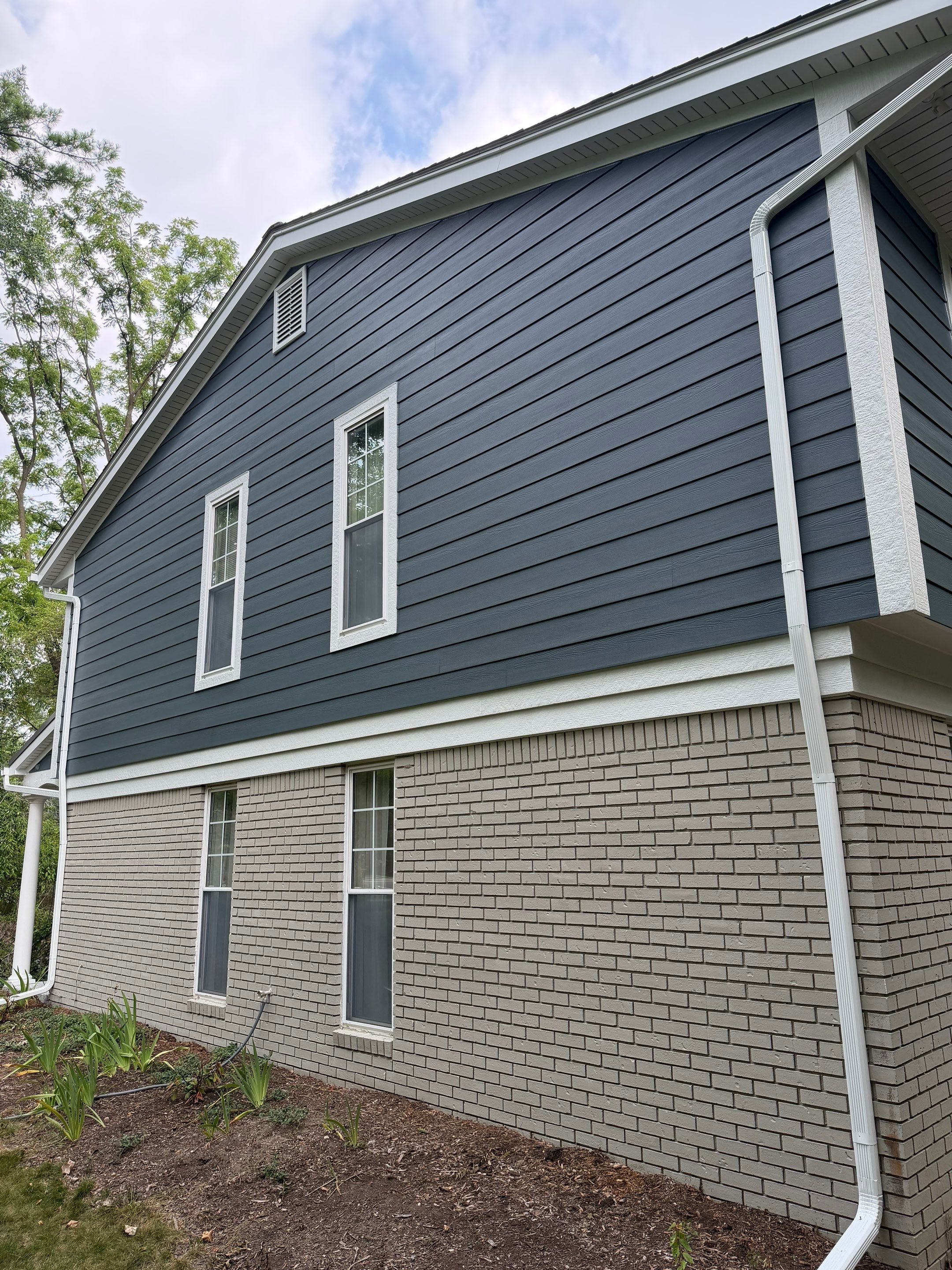 James Hardie Siding Replacement & Metal Roof by Bloomfield Construction & Restoration