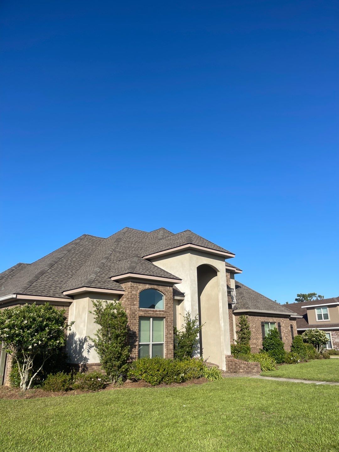 Residential Roofing Installation using Roof Replacement by American Roofing & Construction LLC