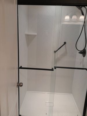 Shower remodel using Maintenance free wall system and shower pan with glass door
