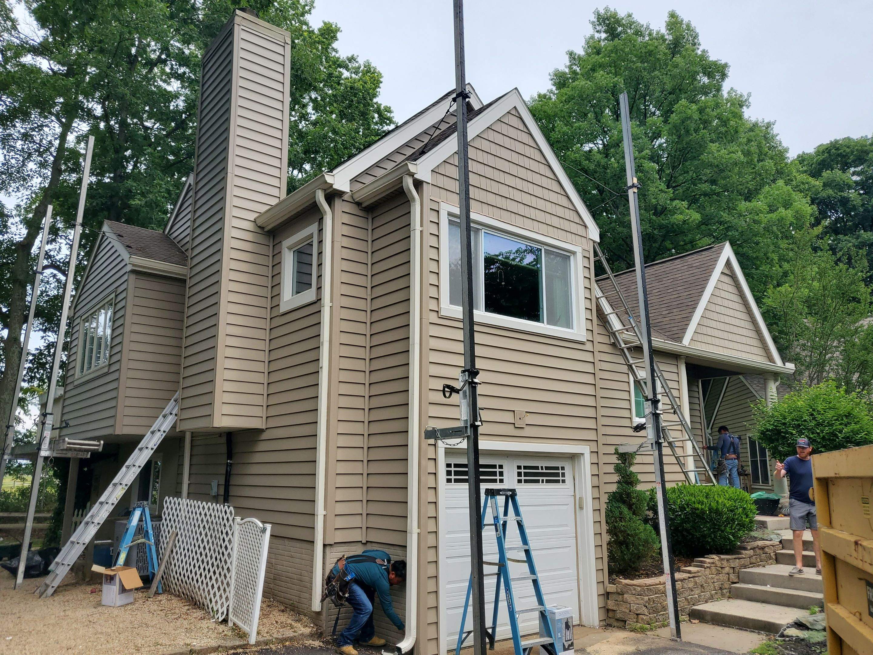 Mastic Siding + Interstate Windows by American Home Contractors