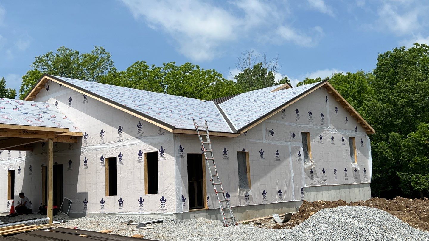 Commercial Roofing Installation using Standing Seam Metal - Burnished Slate Frost by RoofX 