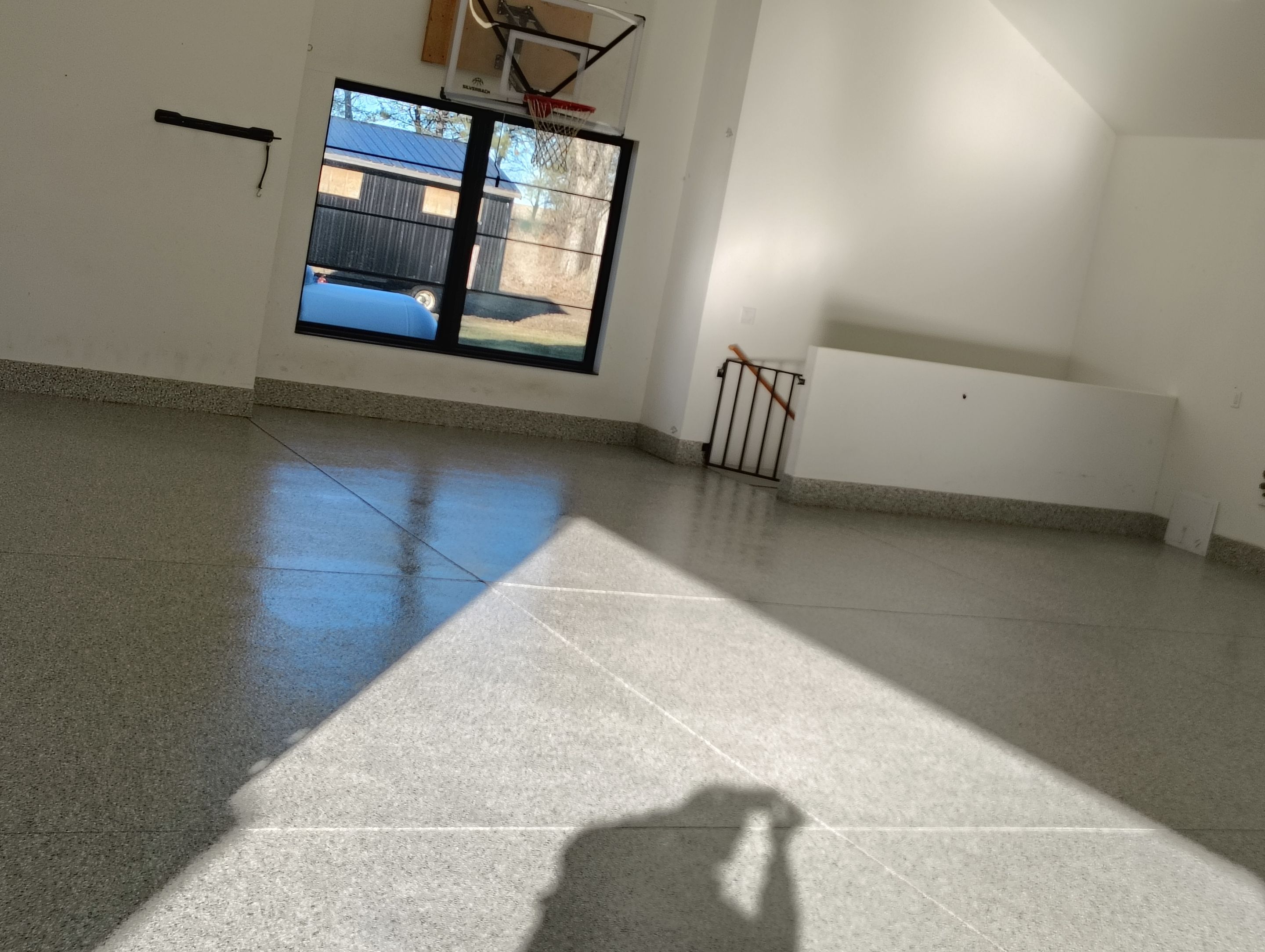 Epoxy Flake Garage Floor and Stair Coating in Sioux Falls by Select Painting, Coatings & Garage Cabinets