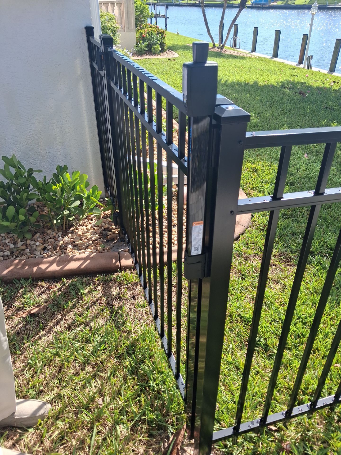 Custom Black Aluminum Fence Enclosure for Punta Gorda Waterfront Property by True Fence LLC