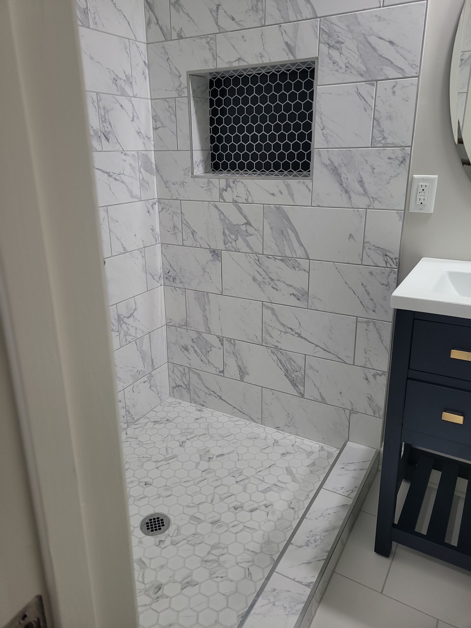 A Pathway to Possibility – Turning a Half Bath into a Full Retreat in Holly Springs by Elite Remodeling and Design LLC