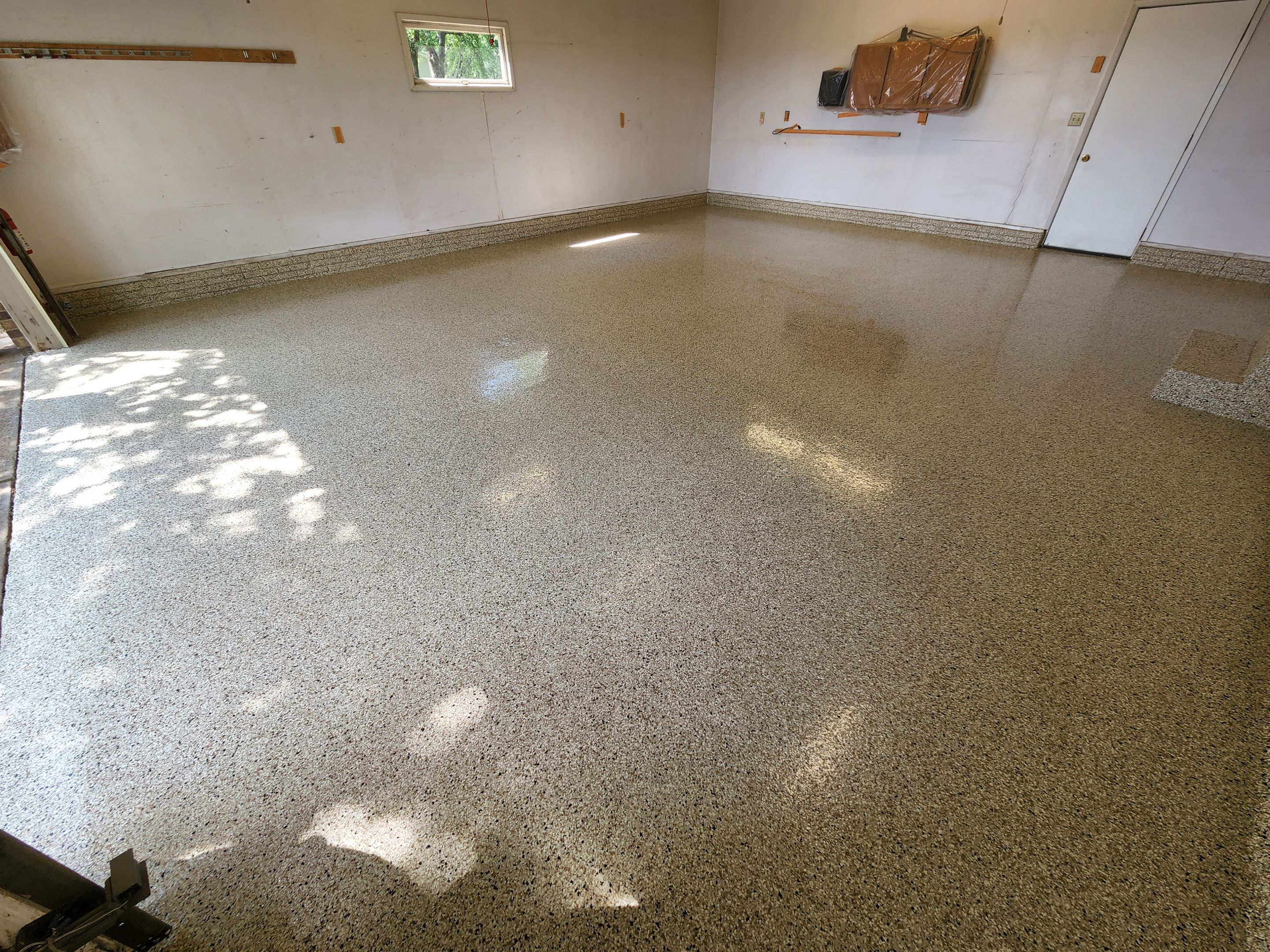 Garage using Driftwood by Select Painting, Coatings & Garage Cabinets