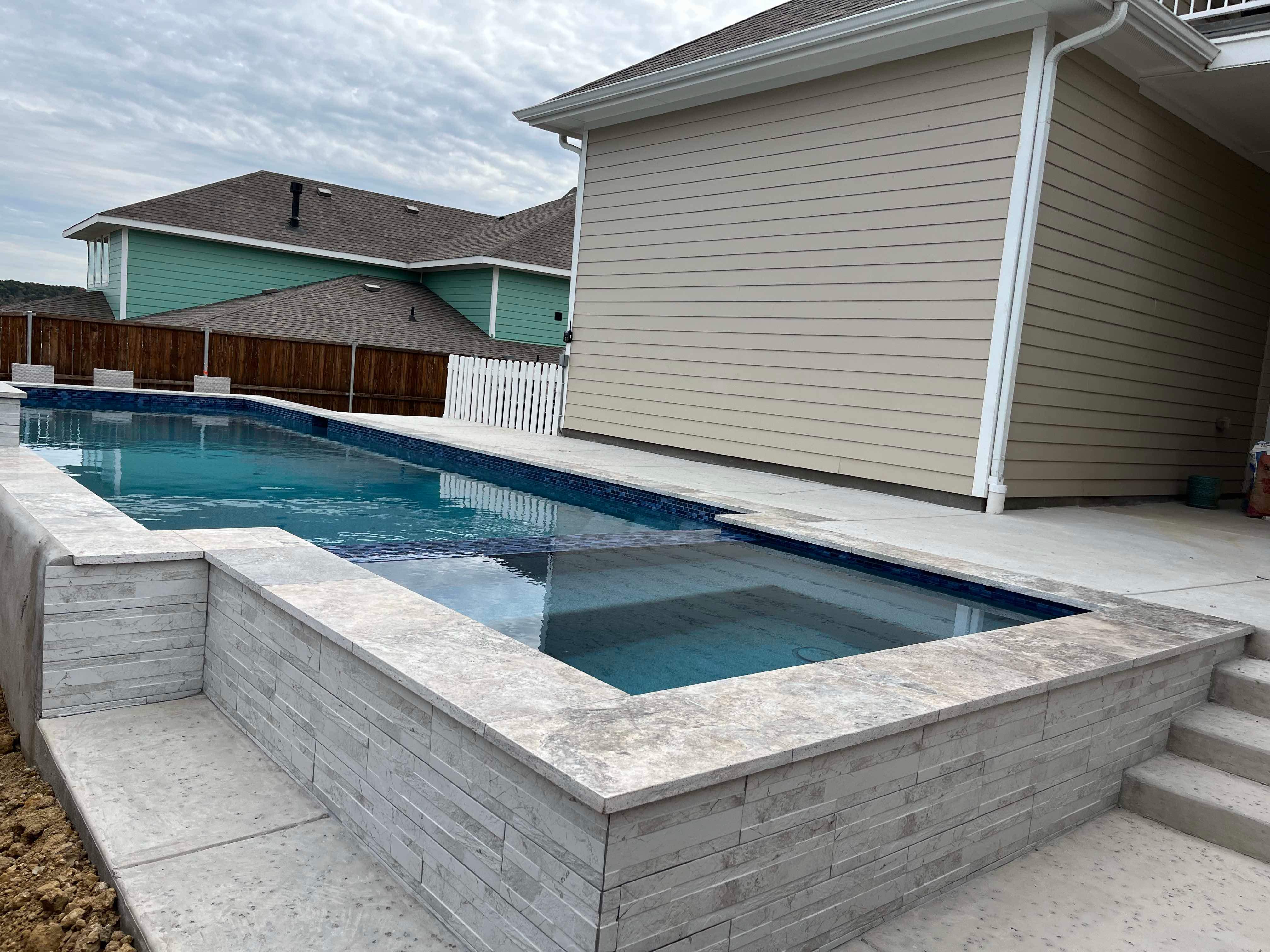 Modern Geometric Pool with Raised Spa by Pinnacle Pools and Spas - DFW