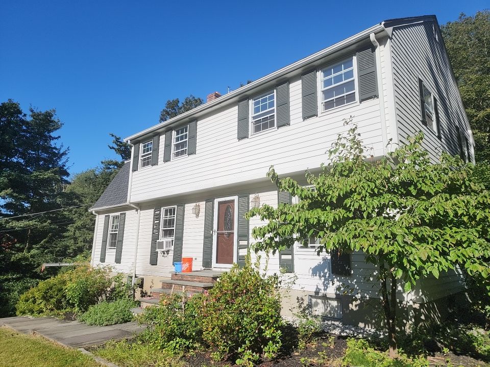 Custom window trim work and siding replacement in Dover, MA by UBrothers Construction