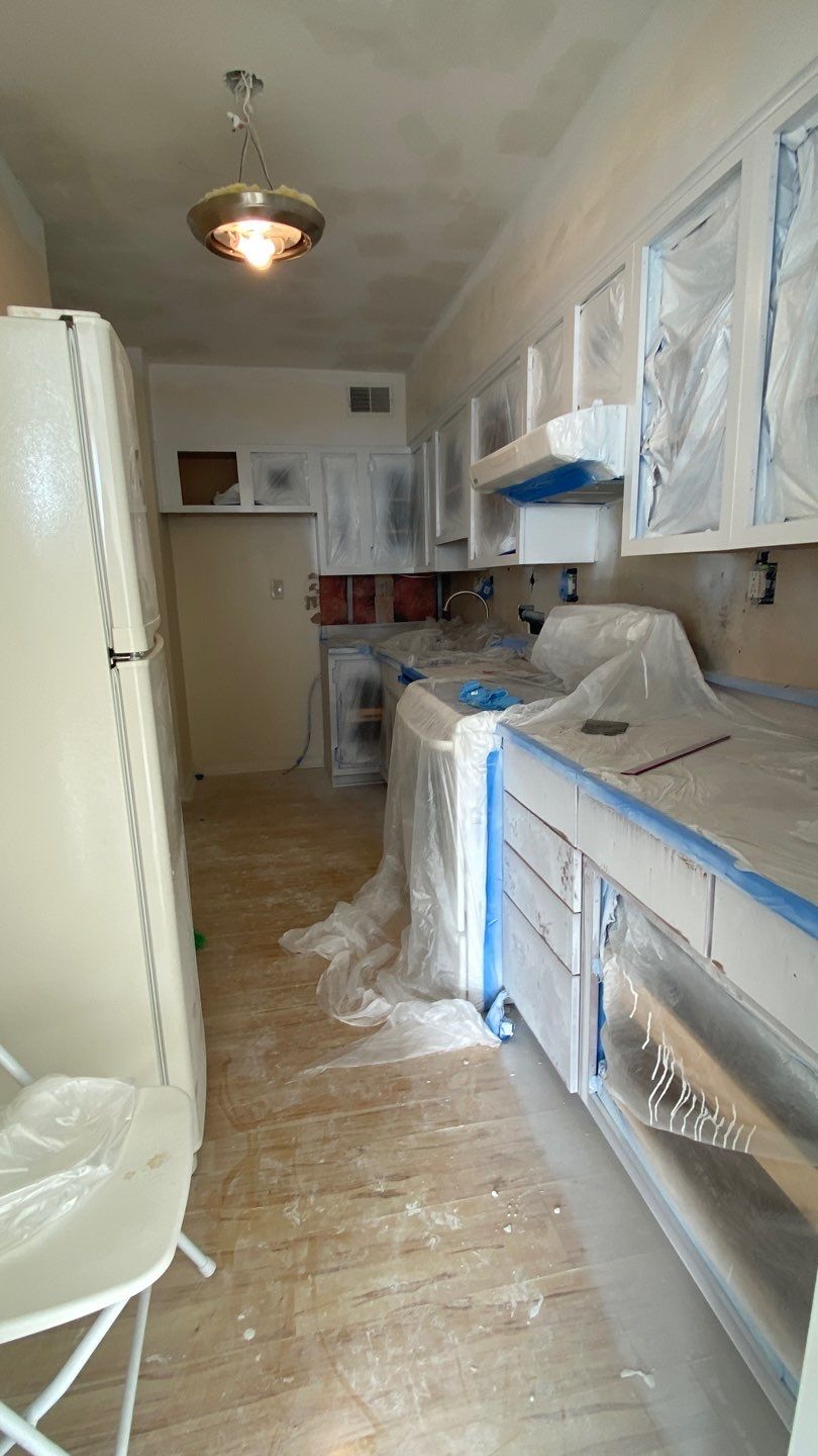 Apartament renovation  using Harwood floor  by Jesus Master Handyman LLC 