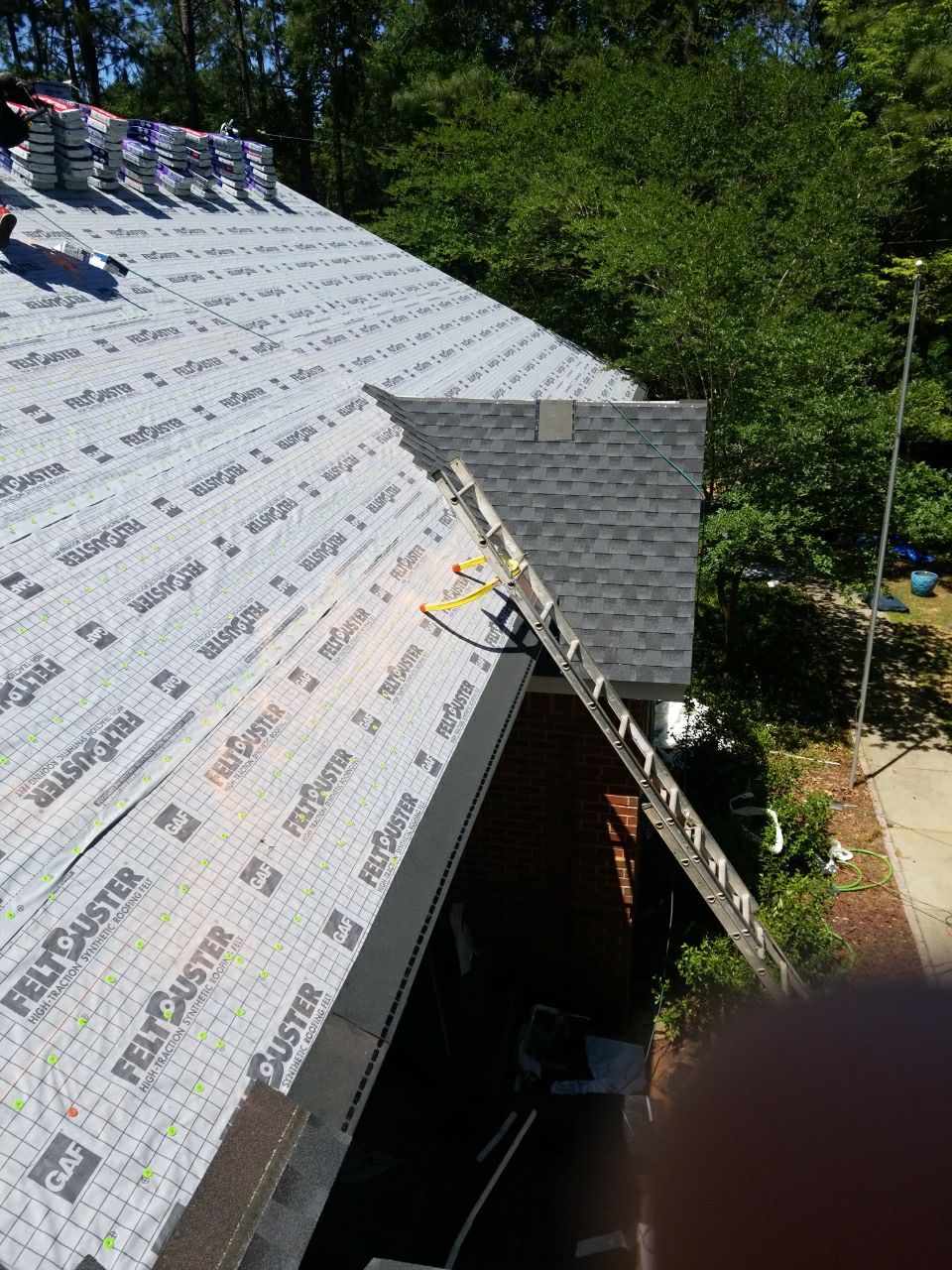 Residential Roofing Installation using Roof Replacement by American Roofing & Construction LLC