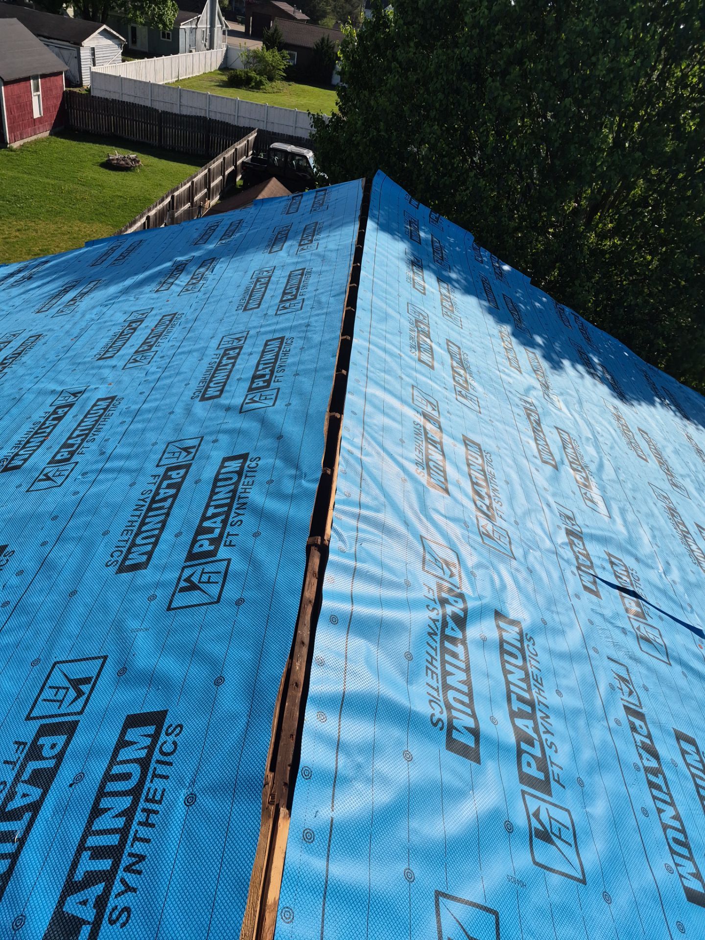 Residential Roofing Installation using Metal by Rainstoppers Roofing