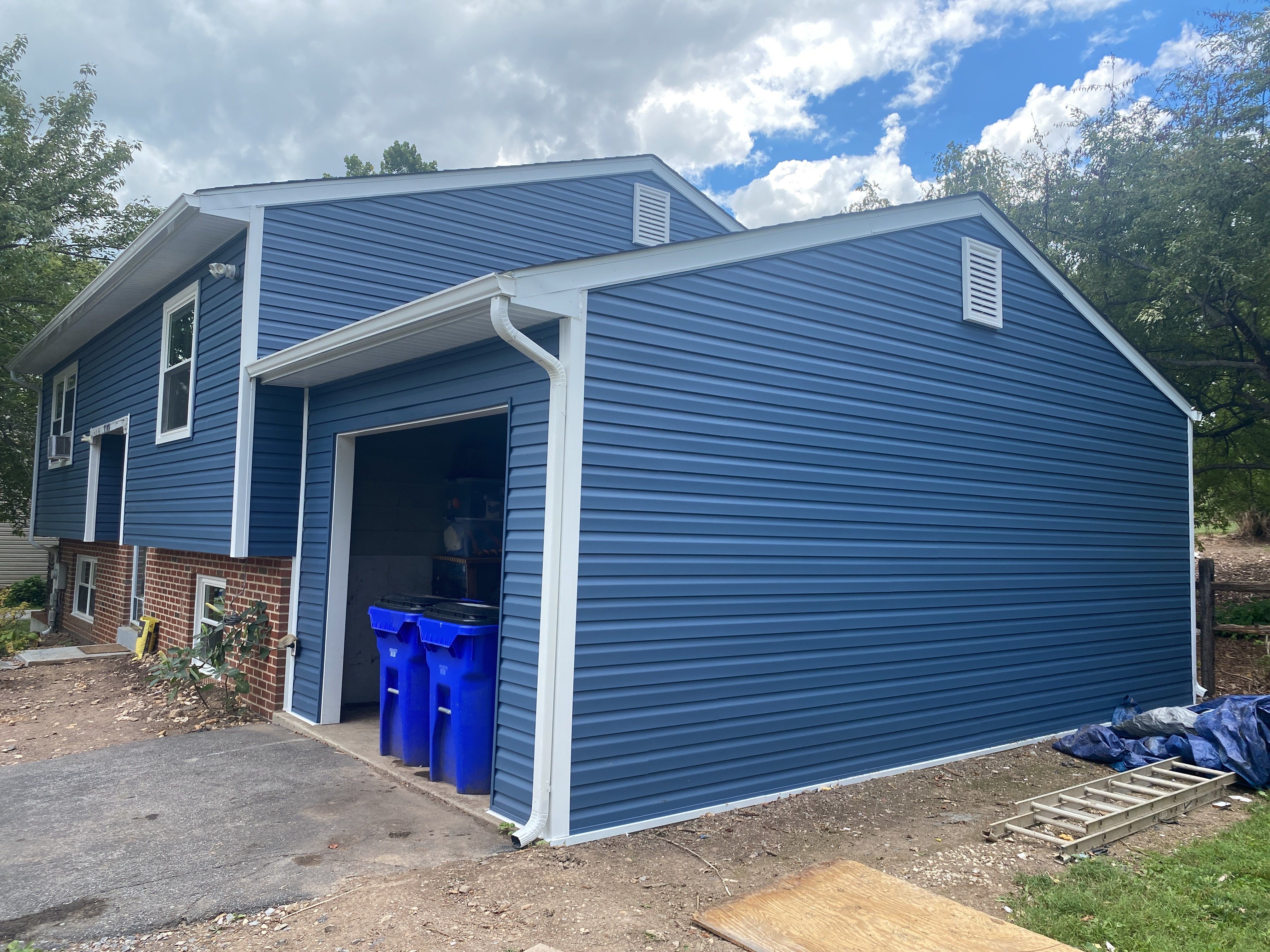 Mastic Siding Replacement by American Home Contractors